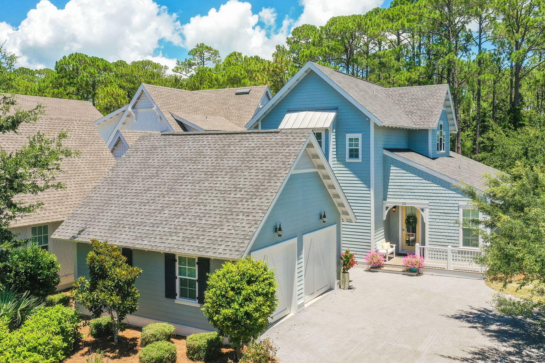 This stunning home in WaterSound West Beach is beautifully finished and furnished and is being offered turnkey. An open concept floorplan offers elegant & easy entertaining. The large gourmet kitchen, lovely dining room with beautiful bar & great room open onto a large screened in-porch overlooking a lush preserve area. This 4 bedrooms plus office (or bunk), 5 bath home with 2-car garage would make a great primary or rental/investment property. A few of the features you will love include: wire brushed distressed hardwood flooring, v-groove wood walls, beautiful lighting, Mother of Pearl shell backsplash and quartz countertops. This home offers abundant windows and a privacy not found in many WaterSound West Beach homes.  South of 30A and is bordered by Deer Lake State Park and the sugary white sands & crystal clear water of the Gulf. The gated community offers private deeded beach access, a beautiful zero entry community pool with clubhouse, outdoor grill and fireplace, miles of boardwalks and access to the WaterSound Beach Fitness center. WaterSound West Beach community is close to shopping and lively eateries of famed Scenic Highway 30-A.