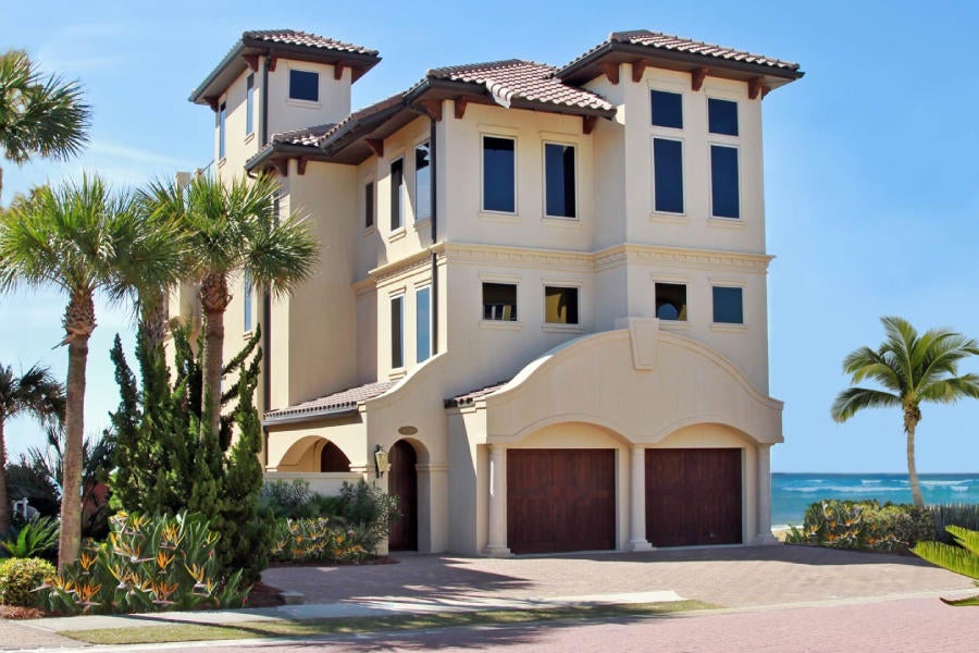 Enjoy captivating gulf views from all four floors of this impressive 5,567 square foot beachfront retreat spanning an impressive three stories primarily located behind the gates of Destiny by the Sea. This expansive Mediterranean home boasts luxurious features including an extraordinary rooftop pool and private sun deck perfectly framed with contemporary glass railing offering panoramic views of the Gulf of Mexico, Choctawhatchee Bay and Destin cityscape. Other notable features include a private elevator, gulf front covered patio on each level with beautiful water views, a private courtyard with room for a potential second pool area, private beach access and spacious media room. This well-designed open concept layout offers seven bedroom suites each with uncompromising privacy well-positioned to enjoy gulf vistas. The second level gourmet kitchen is outfitted with double ovens and a gas cooktop all of which is open to the expansive living room framed by floor to ceiling glass windows that amplify the endless water views. The second level also features two premium master suites complete with spa-like en-suites outfitted with double vanities, a large soaking tub, fireplace, walk-in closets and a wet bar. Exceptional rental potential abounds with sleeping capacity for up to 20 guests comfortably with ample parking including a two-car garage. Located in the community of Destiny by the Sea, residents have access to the 3,000' of pristine private beaches, a resort style community pool and primarily located near all of the shopping, dining and entertainment of Destin Commons.