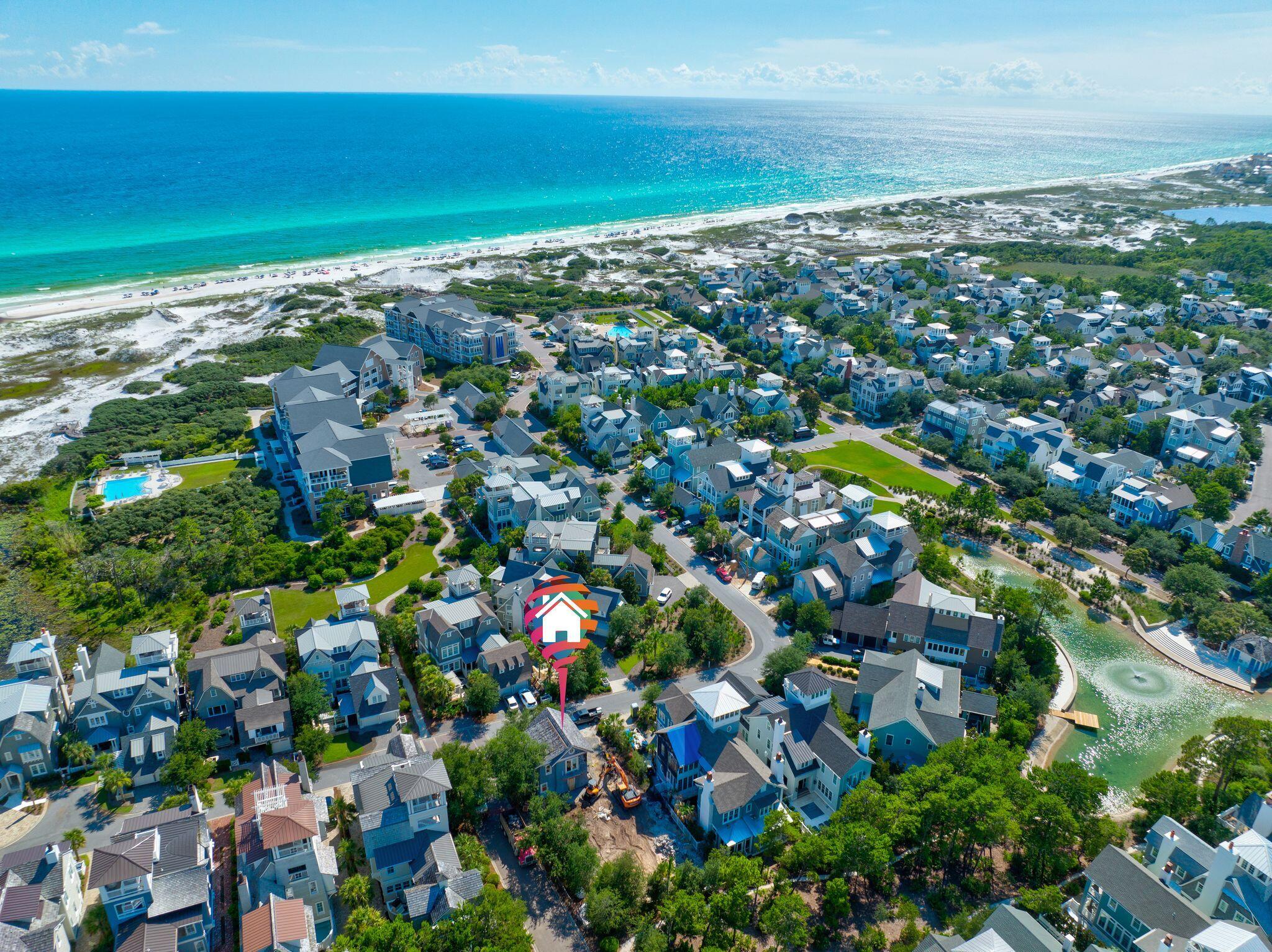 Residing behind the private gates of WaterSound Beach within the Crescent Keel District, this prime development opportunity is poised seconds from the white sugar sand and surrounding iconic town centers of 30A including Seaside, Alys Beach, and Rosemary Beach. The 110' deep homesite offers space for a stately edifice while remaining ideally positioned to take full advantage of the view corridors above showcasing the turquoise-hued waters and famed Emerald Coast sunsets. 
The existing coach house nestled atop the two car garage is nicely appointed throughout and features a kitchen, sleeping quarters, and bathroom suite providing immediate accommodations that can be utilized throughout the build-out process of the main residence. Watersound Beach resides on 1,400 acres with over a mile of private Gulf frontage. The culmination of amenities and exclusiveness affords residents with the epitome of private coastal living while remaining near all of the world-class dining and entertainment venues 30A has to offer. The ideal and intimate location of this homesite coupled with the impressive development potential make this a unique opportunity for investors and full-time residents alike. Inquire today and start envisioning the coastal lifestyle you deserve.