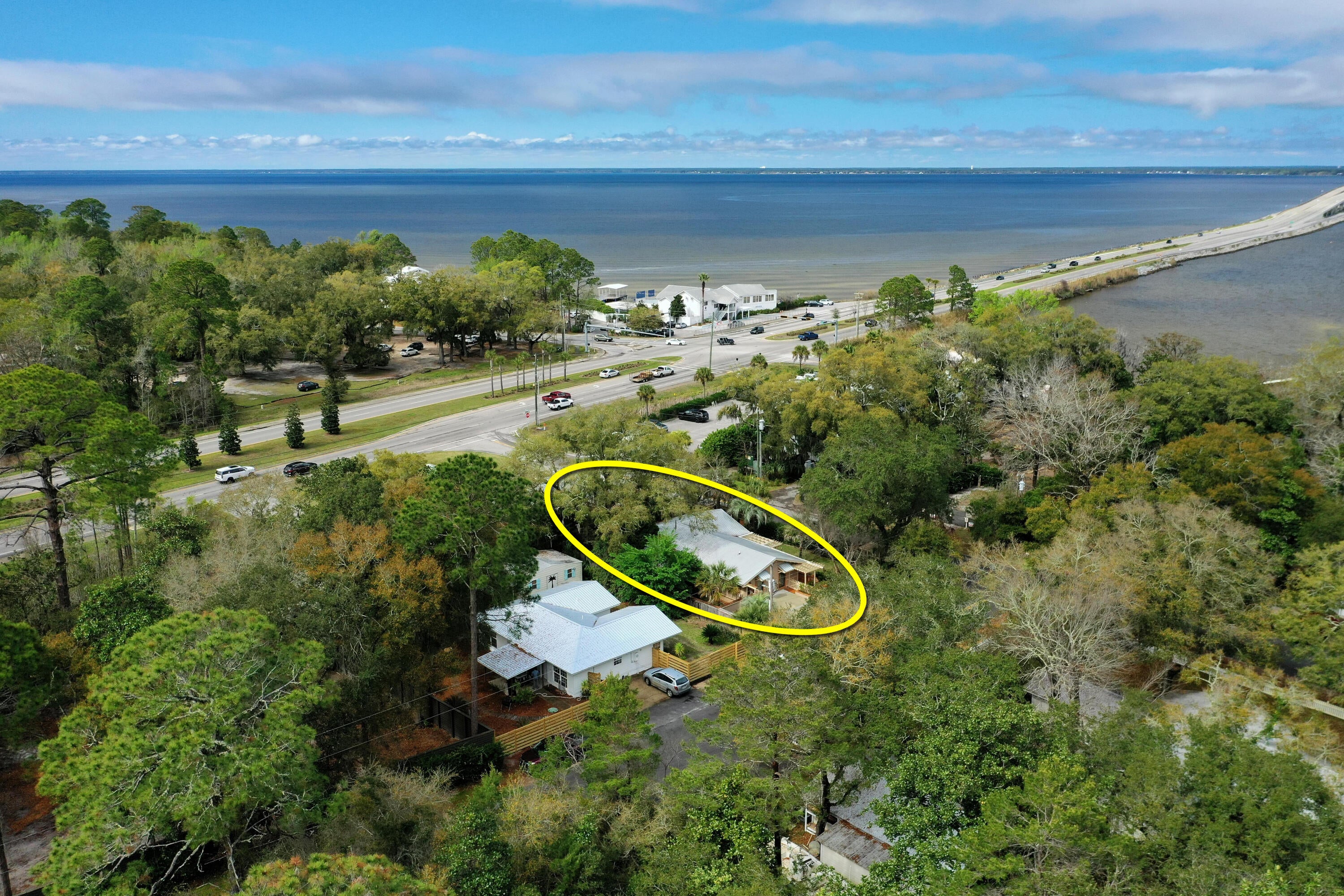 NEW LISTING!  FURNISHED, TURNKEY OPPORTUNITY! A perfectly renovated and charming quintessential Florida style cottage located across from the Choctawhatchee Bay in South Walton County, Florida, only 5-miles to Grayton Beach, which has been voted the Best Beach in America for many years. Conveniently located on the corner of Bay Magnolia Lane and Cedar Street in Santa Rosa Beach, this gorgeous property is within walking distance to the new Pilcher Park for convenient fishing and boat launch, located just off the 331 bridge. This home's quality improvements project an unforgettable streetscape; from its artistically crafted fence to its lush landscaping accentuated by fabulous ambient night lighting, all sides of this cottage... and its property have been beautifully improved to use and enjoy every impressive square foot.
The attention to detail of the finishes throughout this cottage's renovated and expanded interior were of the utmost concern to the owner as well.  Its 4 bedrooms and 3 baths, together with its large open living room and kitchen configuration, offer practical functionality and versatility for various design configurations, not to mention independent access to two of the four bedrooms, thus allowing for lockout scenarios to privately accommodate multiple guests without the disruption to others.
The immediately surrounding area contains some of the best restaurants of South Walton, all within a very brief walk from the cottage.
The graceful street and lot contain old-growth legacy trees, some of which are located on the subject property.
The private, covered porch provides a serene setting for the owner to enjoy a surreal outdoor experience. 
This extraordinary cottage exudes unique character and an overall vibe that is rarely replaceable.   
Please inquire for further details.
