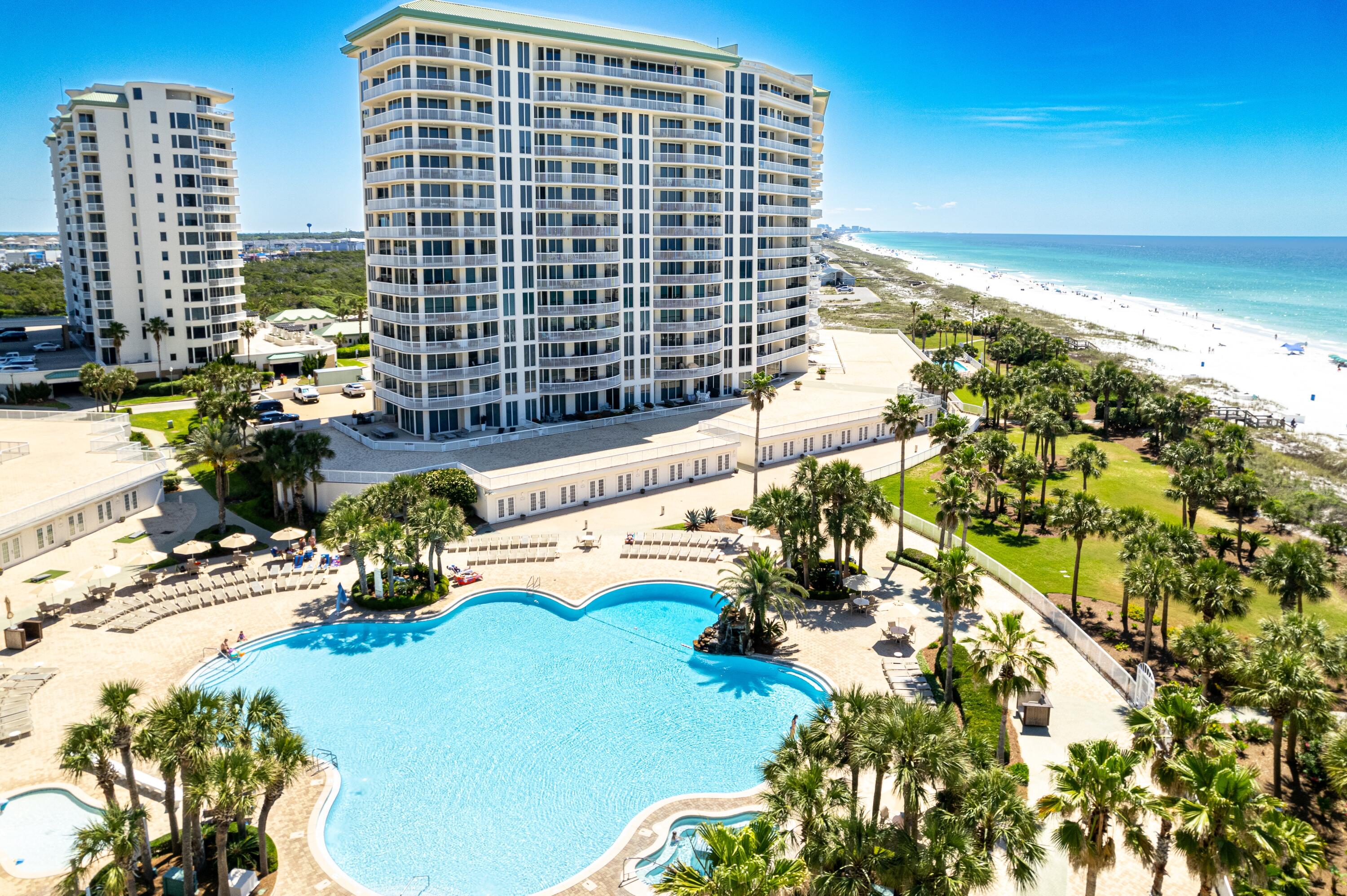 Discover a rare opportunity to own an elite Gulf-front residence within the exclusive St. Thomas building—the most prestigious address in the renowned Silver Shells Resort. Perfectly positioned on the east end and bordered by the tranquil, protected expanse of Henderson Beach State Park as well as never-ending gulf waters, this exceptional corner unit offers unmatched privacy, sweeping views of the emerald Gulf waters, and direct beach access.

Unlike other buildings within the resort, St. Thomas boasts its own private pool, reserved exclusively for its residents—providing a more serene and luxurious experience. No vacation rentals are allowed, ensuring a peaceful, private atmosphere rarely found along the Destin coastline. Step inside Unit 301 to find a spacious and sunlit open-concept layout that seamlessly integrates the Living, Dining, and Kitchen areas. A separate Den offers flexible space perfect for a media room, office, or quiet retreat. The gourmet kitchen is fully upgraded with high-end appliances, sleek island seating, and custom cabinetryideal for effortless entertaining.

All three bedrooms feature en-suite baths and direct access to balconies, offering comfort and seclusion for every guest. The Gulf-front primary suite is a private sanctuary, showcasing unobstructed ocean views and a spa-inspired bath for ultimate relaxation.

Additional features include a large laundry room with abundant cabinetry, a wine cooler, a utility sink with extended counter space, and a convenient secondary entrance. Furnishings are sleek and modern, many curated from Modern Interiors, with striking designer light fixtures throughoutyet every eye is inevitably drawn to endless beaches and the breathtaking Gulf horizon just beyond the windows.

This is coastal luxury living at its most refineda rare, private escape in the heart of Destin. Experience the prestige of St. Thomas. Experience Unit 301.