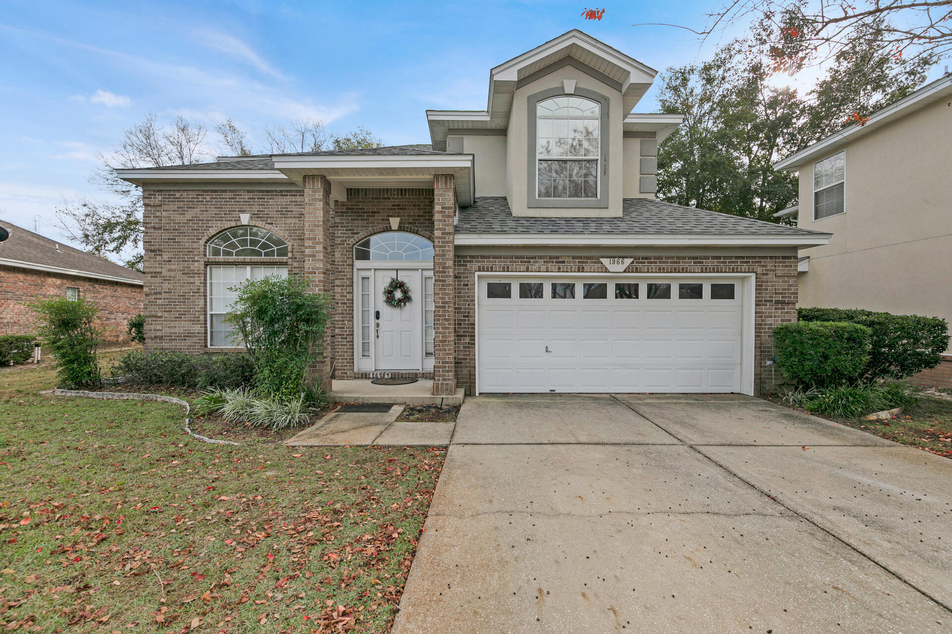 Seller Offering 10k Flex Money to go towards Painting, Closing Costs or use how you wish! New roof installed in 2021! Fantastic Location!  Conveniently near hospitals, schools, restaurants, shopping, and within minutes to either Eglin AFB, or Hurlburt Field.  This beautiful brick home sits in the highly desired neighborhood of North Ridge Creek. As you walk in the front door you are welcomed by the soaring ceilings of the Large great room boasting a natural gas fireplace in the corner and New Laminate Flooring throughout the Living area. Feel the Chill as you have a brand-new AC Condenser in 2023 with Nest Smart Thermostat. The Kitchen encompasses all New appliances and New beautiful Granite Countertops installed in 2022. Enjoy your spacious breakfast bar & eat in kitchen with sliding glass door to the back yard. Your formal dining room has double French doors that lead to a versatile enclosed Florida room/sunroom, perfect for plant lovers, cute little playroom for the kids, or even a separate office! Just off the 2 car Garage you enter a Mudroom/Laundry room which is large enough for a deep freezer or build shelving for some major extra storage! Washer & Dryer Included in the Sale! Upstairs you will find a Huge Master Suite to include a walk-in closet, extra linin closet, separate shower, whirlpool tub, and long double vanity. Across the hall you will find 2 spacious bedrooms, one with a cute reading nook to cozy up and enjoy a good book or use as office space! Don't miss your chance to own this very aesthetically pleasing home on a cul-de-sac complete with beautiful landscaping that's easy to maintain. Plenty of extra parking in the driveway and no large yard to have to mow/maintain are just a couple more of the bonuses this home has to offer! Call Now to schedule your private showing. Sellers Willing to Negotiate New Interior Paint with accepted Offer, call listing agent for details. Homes convenient to the Military Bases go Fast, so don't delay!