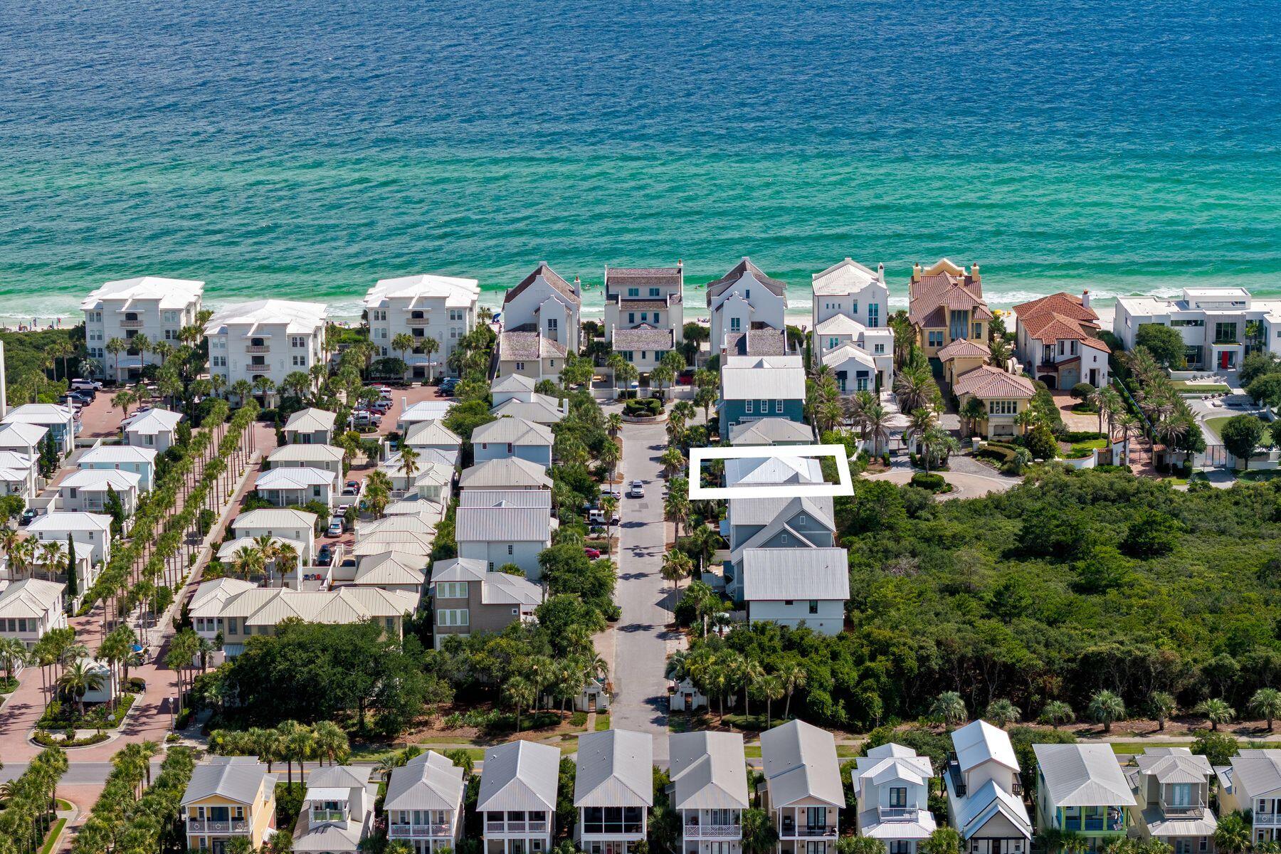 The ONLY 9 bedroom 9 bath home SOUTH of 30A in a GATED community with a PRIVATE BEACH at this price. This outstanding gulf-view reunion-sized house only four tiers from the gulf delivers luxury coastal living with an enviable 30A lifestyle. Located in the upscale, gated community of Sandy Shores, it is one of just 13 luxury homes within this exclusive enclave perfectly tucked away between Rosemary Beach and Alys Beach. The best part, a private beach with beach service. Spread over three floors, this newly remodeled home boasts nine bedrooms, nine full baths, two living rooms, two kitchens and multiple porches overlooking a private L-shaped pool and spa. It's a vacation paradise for investors looking for a rental machine, or a luxury retreat for owners looking to spread out and entertain. Deep porches on every level encourage indoor-outdoor living and provide shady nooks for relaxing with a good book or dining alfresco, cooled by gentle sea breezes. Families will love the 40-foot private pool for cooling off and having fun together, along with ping-pong on the patio. Move indoors to play air hockey or watch TV. A brand new full kitchen on this level is the perfect spot for teens and guests to grab snacks and beverages. With 4 x 2 tile flooring throughout the first level, it is perfect for wet feet or sandy toes. You will appreciate two generous bedroom suites on the first floor each with a full bathroom, and one bath accessible from the pool and patio, and laundry. Thoughtfully constructed with a location to add an elevator to all three levels, this home may also be perfect for full-time living. Modern coastal decor continues upstairs for a laid-back ambience in the second-floor great room. Lie back in cushioned comfort in the sitting room and appreciate this amazing hideaway. A refectory dining table invites intimate social conversation over tasty local seafood prepared in the coveted chef's kitchen. Fully equipped with high-end appliances, it has everything you need, from the wine refrigerator to the island bar. Three more bedrooms on this level each have a full bathroom. Doors open directly onto a full-width porch with stairs leading down to the pool for a morning dip. The lavish master suite is on the top floor and includes a vast bathroom showcasing a soaking tub with gulf views, large walk-in shower and dual vanities.  Throw open the French doors and embrace each new day from the privacy of your own 38-foot balcony. Three additional bedrooms, three beautiful ensuite bathrooms and a second laundry. Last but not least, the metal roof was just replaced in 2025. Contiguous to Paradise by the Sea (a no short term rental community), this home puts you at the heart of 30A shopping, upscale and casual dining, and non-stop entertainment. The white-sand beach offers private access for owners and a seasonal beach chair service. You will never find your beach too busy, and you always have a spot to enjoy. With multiple gross rental projections post-remodel in the $300,000 range, this outstanding beach house with parking for eight vehicles and a garage spot perfect for storing a golf cart, is an entertainer's nirvana and the perfect venue for weddings, reunions and family gatherings.