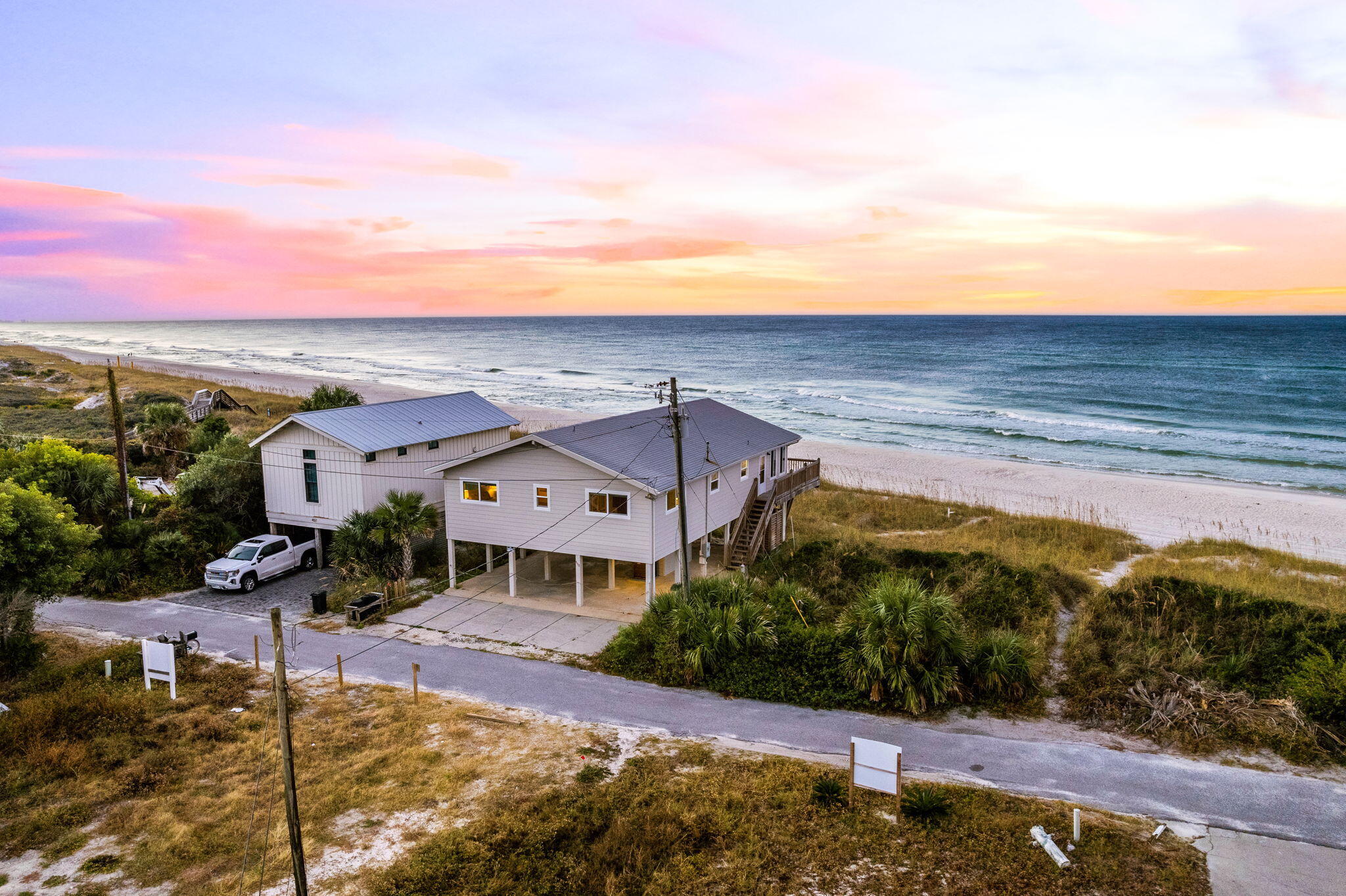 Rare waterfront opportunity on the highly sought-after east end of 30A in Inlet Beach. Prominently situated on over 53 linear feet of gulf frontage and placed southward of all adjacent properties, 490 W Park Place offers unique views showcasing unobstructed expansive views of the sugar white sands and emerald waters. Sunsets experienced from this homesite are truly unparalleled given the position of the parcel. Located at a dead-end of a private road, this setting boasts privacy seldom found on 30A. Inlet Beach is minutes to the famous communities of Rosemary Beach, Alys Beach and Watersound. High-end shopping, world-class entertainment and award-winning dining are all a short walk away. Waterfront opportunities of this nature in Inlet Beach rarely come available. Right up the steps leading to the home, you have access to the oversized deck giving you unobstructed views of the Gulf. Open entry, you are greeted by the cathedral ceilings and the open floor plan. The connected kitchen and living space allows for seamless entertaining and showcases the stunning views from every side of the house. Off of the living space sits the fully glassed sunroom. Currently the dining area and additional living space, this is the ideal spot to entertain your guests. Open up the windows to enjoy the summer breeze and soothing beach sounds, or close in the winter giving you the same unobstructed views of the seashore. Down the large hallway sits the master bedroom with ensuite bathroom. The home is completed by the two guest bedrooms, guest bathroom, and laundry room.

Inquire today and start living the coastal lifestyle you deserve.