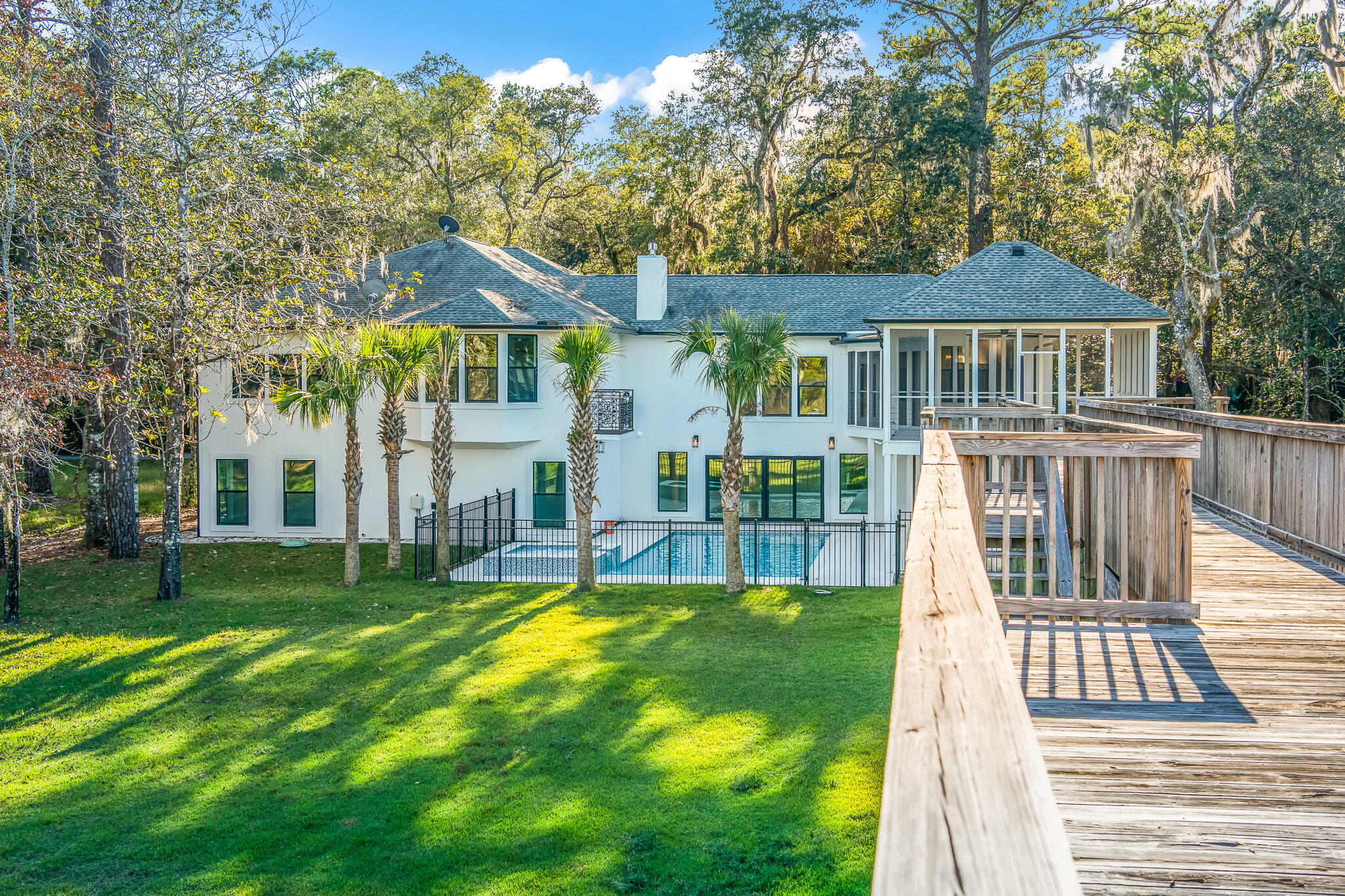 Coastal living at its best... located in the very private and quiet community of the Shallows. Enjoy boat access to the bay while also being only minutes away from the beaches of 30A. Boasting sleek and modern finishes throughout, this home offers unobstructed views, ample outdoor entertaining space, and water access for boating, fishing, or paddleboarding. No expense was spared in the complete renovation of this home, which includes new plumbing, wiring, windows, and top-of-the-line features. Outfitted with shell stone floors downstairs and white oak upstairs, you will find the reverse living floor plan is open, spacious and has an immense amount of natural light. Take in the picturesque bay views from the kitchen, living room and master suite. This home is an entertainer's delight
