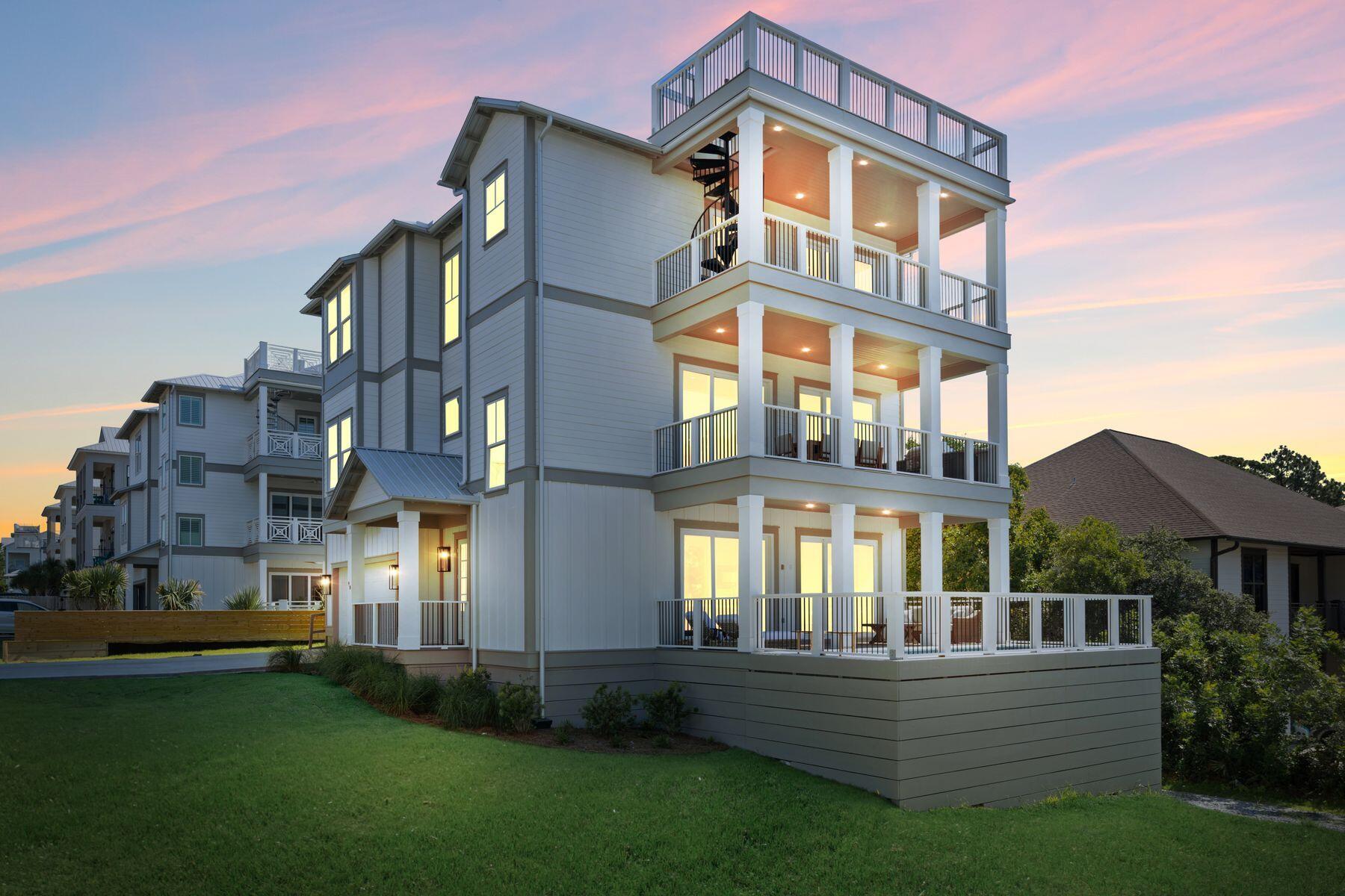 Discover the epitome of contemporary living in this recently completed home, boasting a private heated pool and breathtaking views of the gulf and nearby lake. With a sleek white exterior accented by gray trim, this three-story residence exudes modern elegance from the moment you arrive. Step inside to find a thoughtfully designed layout, featuring balconies on every level and a spiral staircase leading to a rooftop deck, offering unparalleled vistas of the coastal landscape. Each floor offers its own inviting common area, perfect for socializing or enjoying moments of solitude. The main living area boasts beautiful wood flooring, seamlessly connecting the formal dining and sitting areas with the gourmet kitchen. With five bedrooms, including a convenient bunk room, there's ample space to accommodate family and guests in style. Located just 300 feet from beach access and within close proximity to the Santa Rosa Golf Club and Gulf Place shopping and dining, this home offers the ideal blend of coastal convenience and luxury living. Elevated in Flood Zone X for added peace of mind, this is an exceptional opportunity to own a brand-new home in one of the most sought-after coastal neighborhoods.