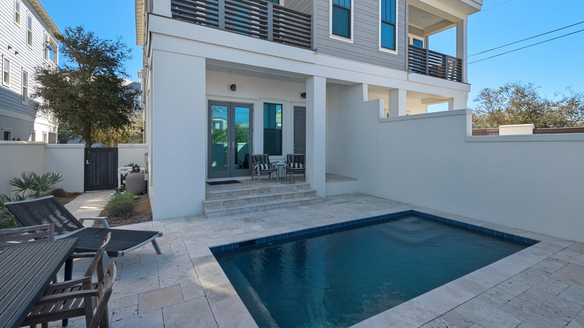 Welcome to Grand Sunsets - true luxury living in The Enclave at Inlet Beach. This is a stunning retreat with a private pool, expansive Gulf views; only steps from beach access, elevator, and gourmet kitchen. If you're looking for an escape along 30A, this is your place. All 4 main bedrooms have private baths. Every bathroom is a true spa experience finished with gleaming white marble. The home is decked out from top to bottom with luxurious designer touches.

Walking into this beach retreat and from the oversized garage you'll find the 1st floor separate living quarters. This bonus area comes complete with full bath and kitchenette. There's a queen sleeper sofa and twin bunks. This room opens to your private courtyard retreat with heated pool* enclosed with privacy fence for outdoor entertaining or enjoying lazy pool days. You'll find plenty of seating and loungers plus a gas grill. This bonus room is a perfect separate retreat if you're traveling with multiple families (or teenagers!).

Head to the stairs or elevator to the 2nd floor that includes 2 master king suites complete with private balconies and Gulf views. Plus there's a bunk room with twin-over-twin bunk beds and private bath.

Up on the 3rd floor you'll find the main living area and gourmet kitchen. No expenses were spared when it came to this kitchen. There's an oversized refrigerator, gas range, and beverage center complete with wine fridge. The elevator is located right off the kitchen to make bringing up groceries a breeze. There is seating for 5 at the kitchen counter and seating for 8 at the dining table (and of course more seating outside)

Head out to the balcony for al fresco dining. Take the spiral staircase up to the observation tower, catch a truly Grand Sunset, and enjoy an evening cocktail. This is by far the best spot in the house to catch the sunrises and sunsets along with those stunning Gulf views. Also on the 3rd floor is an additional master queen en suite and yet another private balcony.

SLEEPING ARRANGEMENTS - SLEEPS 12
1st Floor, Bedroom 1: Queen sleeper sofa and twin-over-twin bunks. Full bath and kitchenette. Pool and courtyard access.
2nd Floor, Bedroom 2: Twin-over-twin bunk room. Private bath with tub/shower combo
2nd Floor, Bedroom 3: King bedroom. Balcony access and private bath with separate soaking tub and shower
2nd Floor, Bedroom 4: King bedroom. Balcony access and private bath with dual sinks and shower
3rd Floor, Bedroom 5: Queen bedroom. Balcony access and private bath with large shower

Looking for a beach day? Head right down the road and you'll have your toes in the sand in minutes. On top of the easy beach access, the location can't be beat when it comes to shopping, dining, and entertainment. You're minutes from 30Avenue where you'll find no shortage of dining and shopping options. If you're looking to explore the area's natural beauty, Camp Helen State Park is practically right next door. Minutes from Rosemary Beach to the west and Panama City Beach to the east, you'll be pleased to have everything you could want on your 30A vacation at your fingertips.