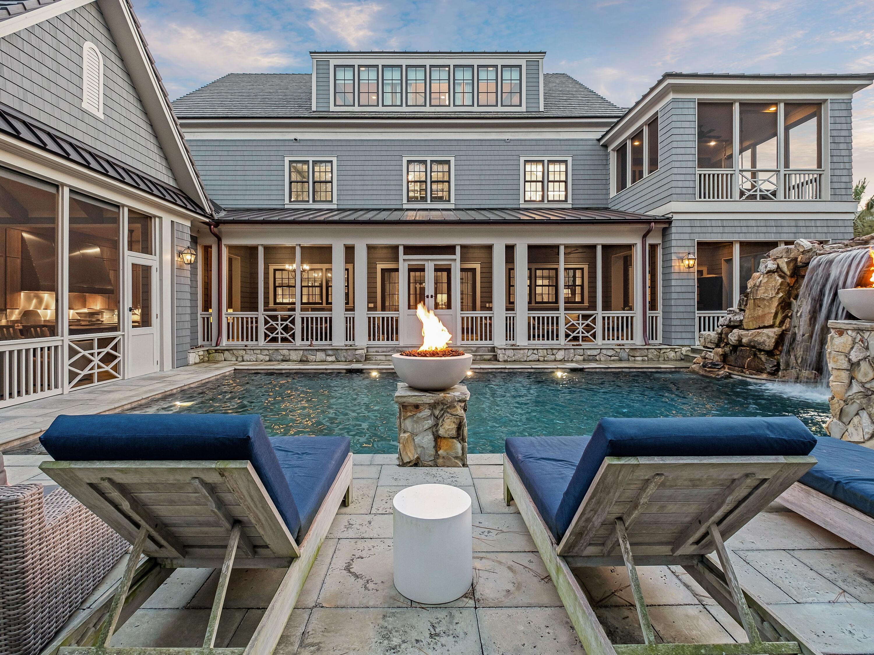 Refined yet inviting, this exceptional T.S. Adams-designed residence captures the relaxed coastal elegance of Scenic Highway 30A. Set within a private gated drive, this home celebrates connection, craftsmanship, and everyday luxury steps from the gulf and the east end communities of Alys Beach and Rosemary Beach. 

The Cape-Cod-inspired architecture captures the effortless sophistication of the coast. Light-filled spaces flow seamlessly across three levels, each designed for both relaxation and revelry. A chef's kitchen anchors the heart of the home, equipped with a Sub-Zero refrigerator/freezer with glass front doors, a 60-inch Wolf range, and a Scotsman nugget ice machine. The adjoining butler's pantry  with a built-in Miele coffee maker, second Sub-Zero refrigerator, second Asko dishwasher, Wolf microwave, bar sink, and additional custom cabinetry to store holiday china, crystal, small appliances, and serving ware   encourages entertaining for every occasion. A dedicated office with beautifully built-in bookcases offers an expansive space to work, read, or study. 

Generously sized bedrooms, including a first-floor guest suite, cozy double bunks to accommodate sleepover guests, dual staircases, and laundry rooms on both the first and second floors confirm that every essential luxury was included in this home's exquisite design.  

Stepping outside, enviable exterior living spaces match the intentional design of the home's interiors. A series of unforgettable experiences combine to create 30A's most coveted outdoor living space: a sizeable kitchen with a Kalamazoo wood-and-gas grill, Kalamazoo artisan pizza oven, and kegerator; one of the largest residential resort-style pools on 30A complete with grotto seating and TV, waterfall, and waterslide; an oversized screened patio complete with dining space, ping-pong table, and seating areas with fireplace and multiple TVs; and, an in-ground trampoline surrounded by lush turf. 

Indoors, each detail reveals thoughtful design  from custom hickory floors, luxe wall coverings, and inviting Restoration Hardware furnishings to marble-clad baths and soft-close cabinetry. The primary suite features a private screened porch, a pecky cypress ceiling, and a spa bath with a hotel-inspired LED-lit mirror that incorporates an integrated TV, providing a magnificent and relaxing respite. 

Five ensuite bedrooms, a full elevator, custom mud room, and specialized amenities like an infrared sauna, full-room golf simulator, Skee-ball machine, wet bar complete with two chilled Sub-Zero beverage refrigerators and pellet ice machine, dog-washing station, secondary living space, and wine storage closet  elevate the feel and function of this estate. Every element, from the brass gas lanterns to the Sonos-integrated soundscape, reflects an attention to detail found only in a custom-built residence of this caliber.  

Should one find the proximity of the recently redesigned Camp Creek golf, tennis and pickleball facilities appealing, membership in the exclusive WaterSound Club generously accompanies the sale of this home, giving buyers access to the most prestigious private beach and sport club along the Emerald Coast. 

With gulf views, deeded, gated beach access at the end of the street, and no HOA restrictions, this extraordinary home embodies a rare balance of elegance, privacy, and pure coastal joy. It is a spectacular place to call home  be that as a primary or secondary residence or as the ultimate 30A rental property for the savvy investor looking to provide a one-of-a-kind experience to rental guests. 179 Brenda Lane is more than just a beach house; it is the defining property for those looking to stop dreaming about the 30A lifestyle and start living it.