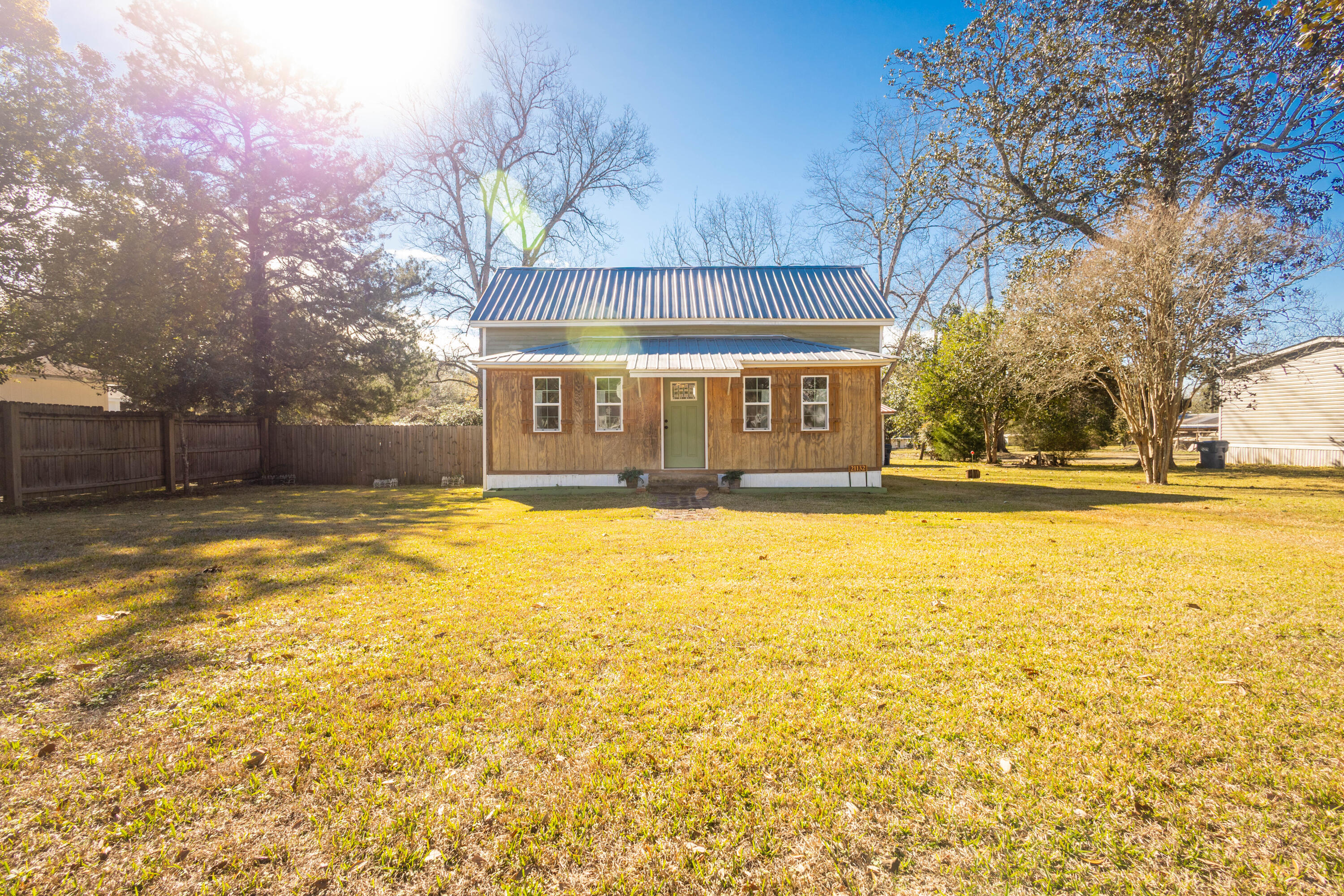 $4500 Seller credit with acceptable offer for HVAC!    Built in 1910, full of character and small-town charm. This cozy residence reflects the craftsmanship of an earlier era while offering comfortable, functional living spaces. The front porch area has been enclosed creating a blank canvas for the entryway of your dreams. The kitchen features an early 20th century cast iron sink. The bath features a cast iron clawfoot tub and stand-alone shower. The bedrooms are large and bright with a jack and jill bath. The back yard is fenced and includes two large sheds for storage.  Built and used as a school house for the church that was next door, this home has history.  Schedule your visit today!!!  This home does not have heat, window AC only.