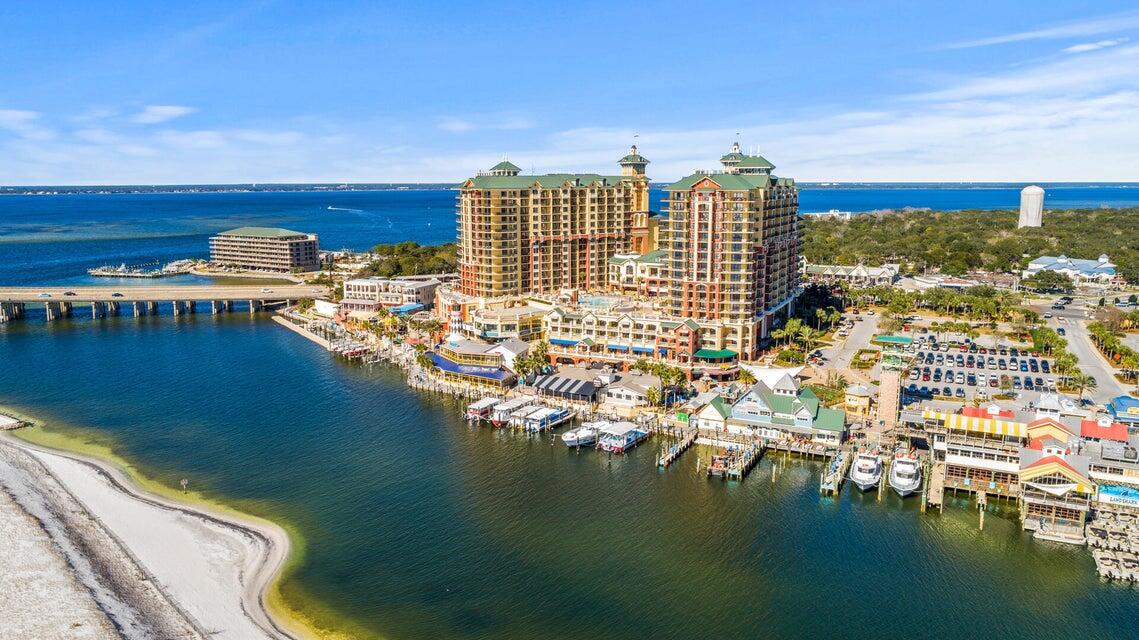 GREAT PRICE REDUCTION. Prime unit opens directly to pool deck. 2 Bedroom plus bunkroom makes for 3 separate sleeping areas, and 3 full bathrooms that sleeps 8+ on the Grande Vista level bar/pool/restaurant deck! This Beautiful condo is perfect for the use of a primary residence, a vacation home, or a short-term rental. There are two convenient private patios that lead directly onto the pool deck where you can watch the children play. The luxury vinyl flooring is throughout with tile in the wet areas. The kitchen opens to the family room and has granite counter tops, lots of cherry cabinets, stainless appliances & RENTAL READY for you!