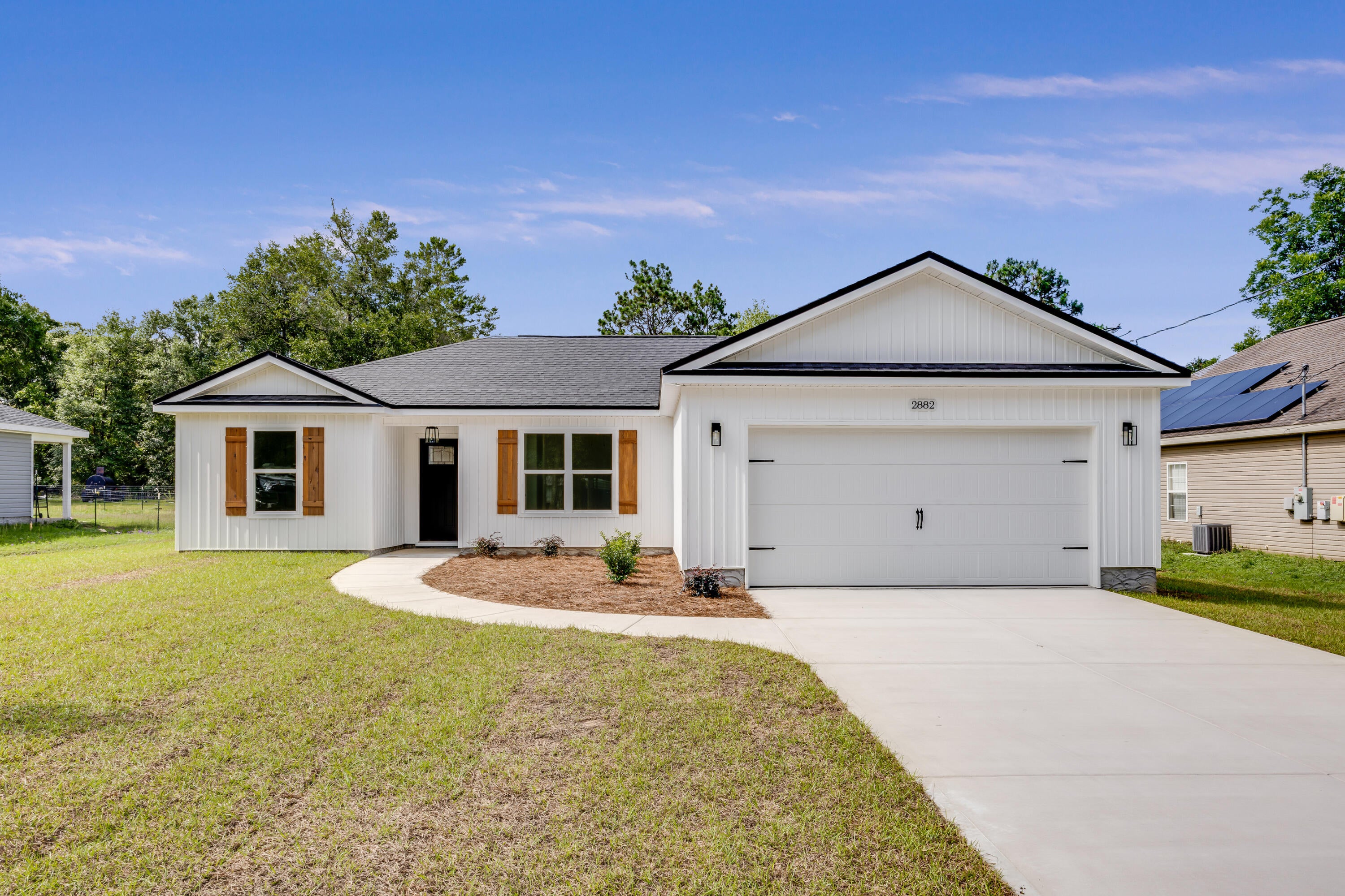 Come check out this beautiful custom-built home. Seller to contribute $7K toward buyers closing costs! The primary bedroom has a barn door, primary bathroom has a custom tile walk in shower, walk in closet and a double vanity sink with drawers, LVP flooring throughout, kitchen has quartz countertops with Whirlpool appliances. Beautiful contrasting tile backsplash with pot filler above stove. Two car garage with epoxied floor and a 7' x 10' back deck. Don't miss out on this opportunity. Call your favorite agent today!