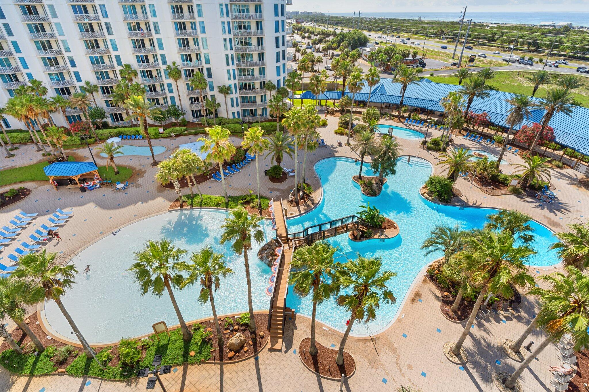 INVESTORS - Welcome to your new Coastal Retreat! This condo features a full 2-bedroom 2 bath located in south end of the tower.  Zero walk-in lagoon size pool, splash pad hot tub for your enjoyment.  The gulf beaches are quick ride away with shuttle service. Or stay busy with fitness center, gated children's playground, indoor pickleball and basketball courts. 
Food and refreshments are available at The Blue Lagoon Restaurant, coffee bar and outdoor Bar.
Investors this beautifully updated unit is a rental machine. Similar units like this have grossed $65K rental income annually. New Hot Water Heater & HVAC 2023. New white statement tile shower, toilets and Vanity. Walk in Bedroom Closet. New Paint. Investors this is the turnkey unit you are looking fo