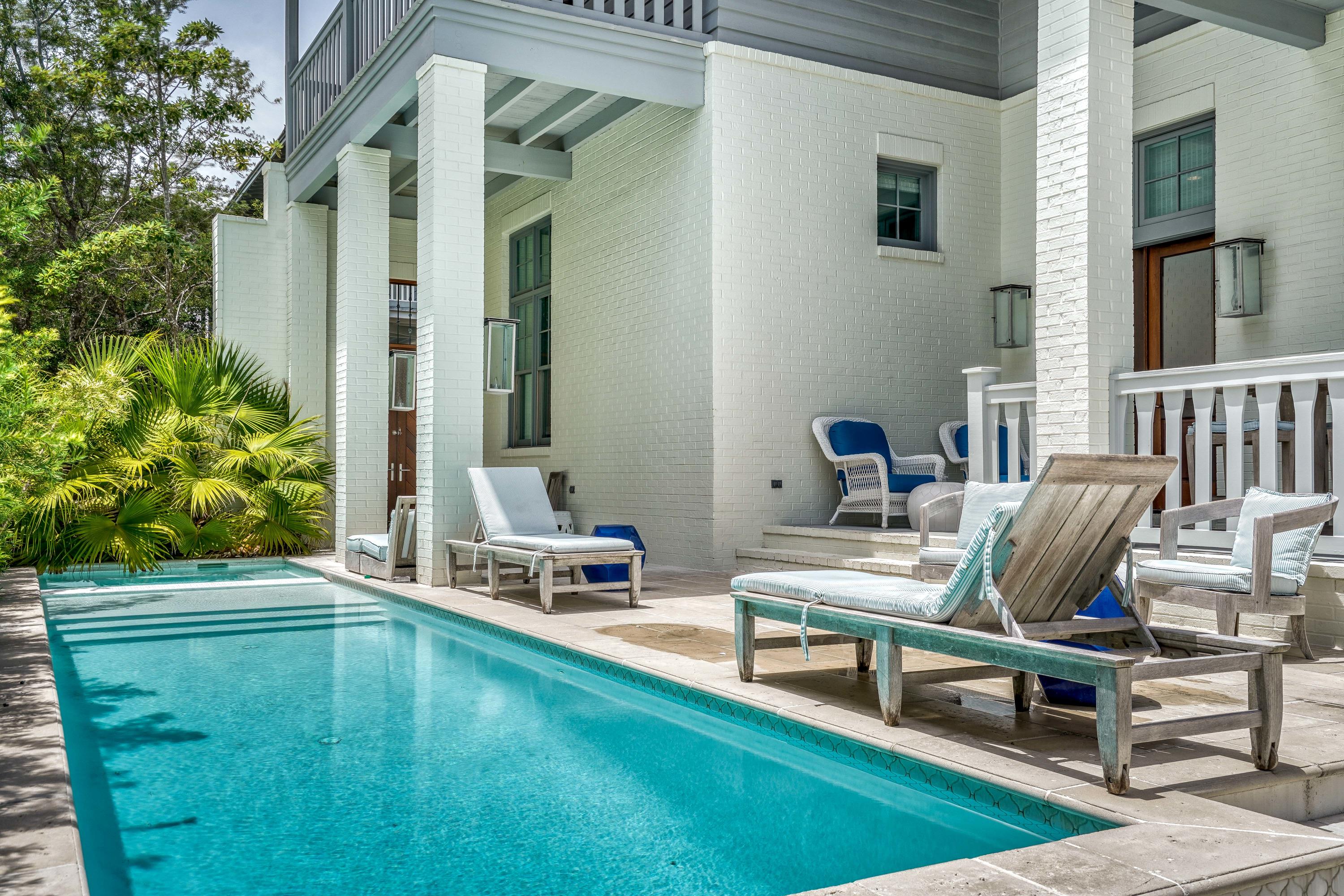 'ON THE BOARDWALK' & SO CLOSE TO BEACH, NEWLY DECORATED, SOUTH of 30A & steps to COQUINA POOL. MAIN LIVING ON THE FIRST FLOOR IS SO EZ IN & OUT OF PRIVATE POOL AREA. Home has DEN for the kids as well as LIVING ROOM, DINING AREA adjacent to CHEF'S KITCHEN w/ huge island, & pantry. The Main House w/ 4BR & 4.5 BA, LOFT w/ 4 BUNKS & 882 sf porches. CARR HSE is 800 SF w/ 1 full BR & 1.5 BA & laundry Area. Coastal chic dcor & PRIVATE POOL/HOT TUB so you can relax IN YOUR OWN OASIS. Chef's KITCHEN & BUTLER'S PANTRY. Outdoors this home boasts a beautiful PRIVATE POOL w/ Hot Tub, & spacious pool deck & outdoor shower. 2 car GARAGE plus bonus parking space equals parking for 3 cars!! This FABULOUS LUXURY home has ESTABLISHED RENTAL INCOME & is THE PERFECT VEHICLE FOR THE SAVVY INVESTOR. RENOVATIONS INCLUDE: enclosed upstairs porch adding 133sq.ft., freshly painted exterior, newly added pool & pool deck, new pool area and driveway pavers, new outdoor shower, new exterior light fixtures, freshly painted interior, new kitchen cabinets & countertops, new appliances, new bathroom tile flooring, vanities & counter tops, new wood flooring throughout, new shower doors, new 2nd floor layout, new Pecky Cypress door, new pantry, new metal handrails, new bath accessories, new door hardware, glass pocket doors at dining area, new built-in beds on 3rd floor, new wet bar on 3rd level, new surround sound speakers in living area & new electrical fixtures throughout! Information contained within this listing such as square footage, is deemed to be accurate but is not guaranteed. Buyer to verify