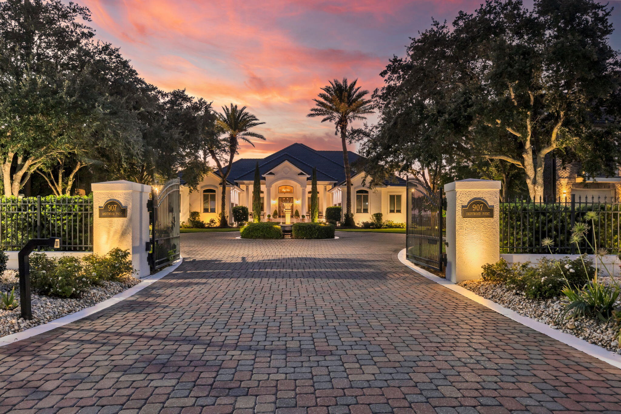 Welcome to this extraordinary two-story Mediterranean home, custom built by CD Jones on Four Mile Point in Driftwood Estates. From the moment you arrive, the atmosphere shifts—brick pavers lead you through the gated entry, past the fountain, and into a serene bayfront retreat where peace and beauty abound.  At dusk, professional lighting highlights the gardens, pool, outdoor living areas, and walkways, creating a breathtaking ambiance. By day, natural light pours through the windows, illuminating painted oak floors and a travertine entryway. In the kitchen and entertainment area, Venato Quartzite countertops reflect the sunshine continuing the fresh, timeless aesthetic. A 2020 upgrade in the kitchen includes a Wolf range top and sub zero refrigerator making cooking enjoyable and entertaining effortless.  This home is designed to embrace its surroundings -glorious sunsets over the Choctawhatchee Bay, dolphins leaping, pelicans diving, and even the occasional passing manatee family. Multiple spaces invite you to relax: a secret courtyard perfect for private conversations, the lanai and pool overlooking the bay, or the game room with a 180-degree view of the water, ideal for gathering with friends and family. The outdoor kitchen in the lanai makes alfresco dining a breeze.  Multiple upgrades since 2020 and most recently a new roof in 2025.  The new boat dock offers direct access to the bay -launch your boat for deep-sea fishing in the Gulf of Mexico or enjoy a leisurely cruise across the bay.  This property isn't just a home -it's an unparalleled lifestyle of beauty, peace, and bayfront living. Full list of upgrades and improvements available in the documents section.  Piano and Pool table will convey with property.