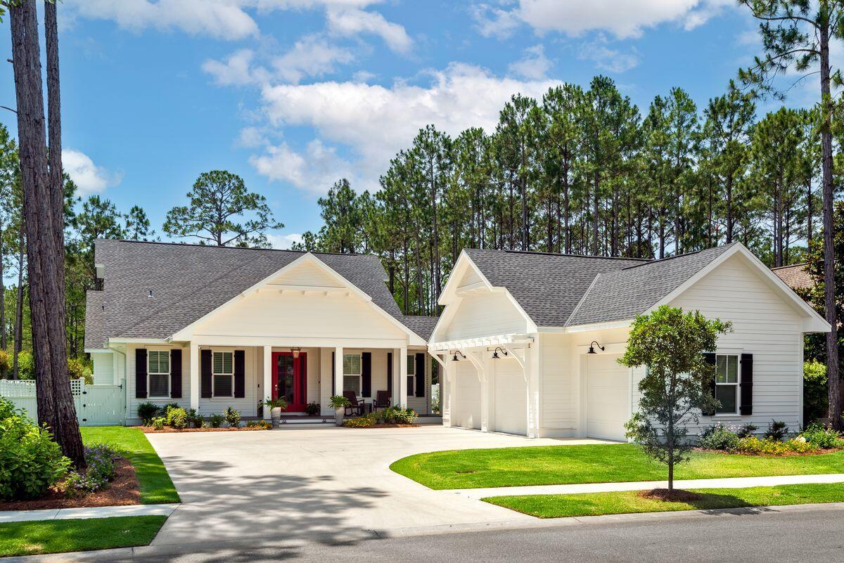 Welcome to 359 Cannonball Lane in Phase 1 of Watersound Origins! This exceptional home boasts an array of features and amenities that truly set it apart. With 5 bedrooms, 4.5 bathrooms, and 3,220 square feet of living space all on one level, this home designed by the developer of The Pearl Hotel and built by Huff Homes offers a unique floor plan that is one of a kind in Origins.
Situated on a generous .352-acre lot backing up to a preserve, this property offers privacy
and tranquility. The expansive driveway can accommodate up to 6 cars, in addition to the 3-car garage featuring custom skid-proof epoxy flooring. The location is ideal, with just one street separating you from the Golf Course and Origins Community Center. Enjoy easy access to the covered mailroom, community pool, fitness center, pro shop, and fenced-in playground.

Step inside to discover a stunning interior that leaves nothing to be desired. Throughout the home, you'll find Medallion Collection Grey Mist hand-scraped and wire-brushed flooring, creating an elegant and timeless atmosphere. The foyer showcases a magnificent hand-blown Chihuly-style glass chandelier, making a grand statement upon entry. The great room is designed for both functionality and style, boasting a wall of bookshelves and cabinets for ample storage. The countertops are Lasa Quartz, and a dry bar with floating shelves and two dual-zone wine refrigerators is perfect for entertaining. Enjoy movie nights with the LG 77" OLED TV and immerse yourself in the Sonos surround system with ARC, bass woofer, and two speakers.

The kitchen is a chef's dream, featuring a 12-foot island accommodating six bar stools, a Sub Zero 42" refrigerator, a Wolf 48" gas range, Wolf double convection ovens, Cove (Sub Zero) dishwasher, and a Wolf microwave. The range hood includes a remote blower fan, significantly reducing noise. The Krause 33" flat apron single bowl sink and Delta Lenta touchless pull-down faucet add both style and functionality.  The kitchen countertops are adorned with Silestone Eternal Desert Silver in a suede finish, complemented by AGM Arabescato Lucca in a polished finish. The backsplash features Elon Tile & Stone Serpentine with gold aluminum tiles, truly making it a showstopper. Restoration Hardware Utilitaire glass slope shade pendants and an Adler bronze chandelier complete the upscale ambiance. 

The primary bedroom offers a serene retreat with a master bath featuring Cambria Clareanne Matte Quartz countertops, Linea White Oblique wall tiles, and Bianco Carrara Bubbles polished tiles. The flooring is Epic Dolomite Matte, and a massive walk-in closet with a radiant heated towel bar adding a touch of opulence. The four bedrooms in the main house are complemented by a separate and attached full bedroom with ensuite and walk-in closet similar to a carriage house but located on the main level.

The backyard of the property feels like a mini resort. It is fully fenced with landscaping meticulously designed by an architect. The outdoor oasis features a heated pool with a hot tub, complete with lights and saltwater system. The pool area showcases elegant travertine pavers, custom cobalt glass tile, and convenient Wi-Fi control. For added security, the windows and doors are equipped with alarms. Sports enthusiasts will delight in the game court, and fun can be had at  bocce ball, horseshoes, or cornhole. There is also a covered pergola area and an Elementi Boulder natural gas fire pit. The raised garden beds with irrigation and greenhouse provide the perfect space for cultivating your green thumb. Additionally, a natural gas feed is available for the BBQ grill.

For enhanced security, Eufy motion-sensitive video cameras and SimpliSafe motion-sensitive security system are in place. Lastly, the home is equipped with a full-house Generac generator (24 KW) that is Wi-Fi enabled and powered by natural gas which ensures your comfort, your security and your peace of mind.