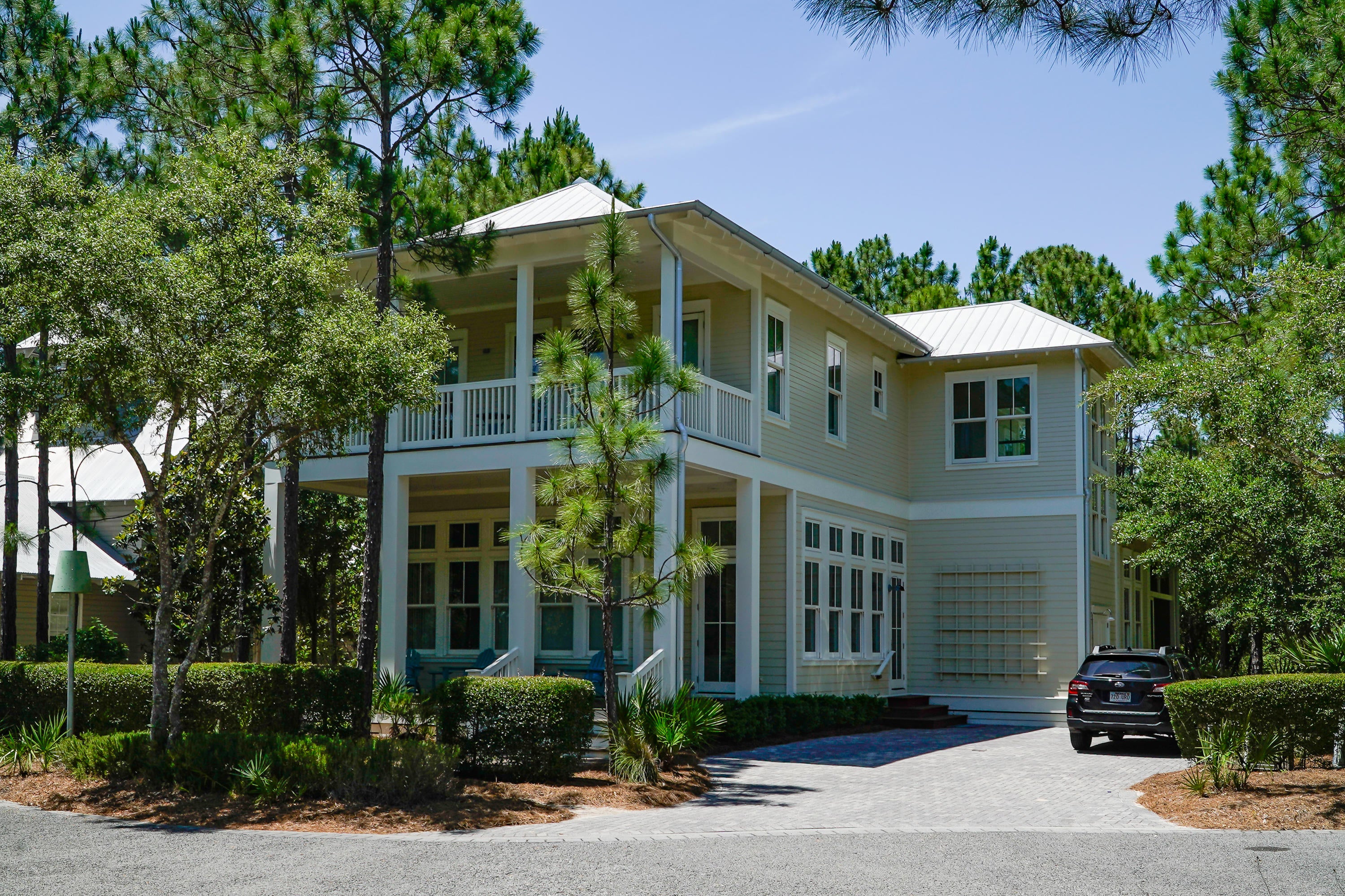 Exquisite home from Romair Construction in Phase III of the vibrant WaterColor community! This custom beach retreat is tucked away on a large lot on a quiet cul-de-sac just minutes from popular community amenities including Camp WaterColor and multiple swimming pools. Over 3,400 sq. ft. of beautifully designed living spaces with 4 BR and 4.5 BA provide ample room for family and friends to relax. Design features include open concept living and dining, a fully-equipped chef's kitchen, a spacious screened porch with an outdoor fireplace and a second floor bonus sitting area with built-in bunks. Special finishes include soaring 12' ceilings throughout, gorgeous hardwood floors, shiplap walls, built-in shelves, marble countertops and custom cabinetry. Home on a large lot with plenty of room to add a pool or carriage house. The driveway can hold 5 cars! Located on 499 acres in the renownedWalton Beaches, WaterColor was created with families in mind and offers the charm of small town life. Exceptional community amenities include several beautiful swimming pools, a gulf front beach club, nature trails, kayaking, canoeing, a fitness center, tennis, Camp WaterColor for kids, parks and green spaces. Highway 98 is minutes away making travel to both Destin and Panama City Beach convenient as well the Northwest Florida Beaches International Airport.