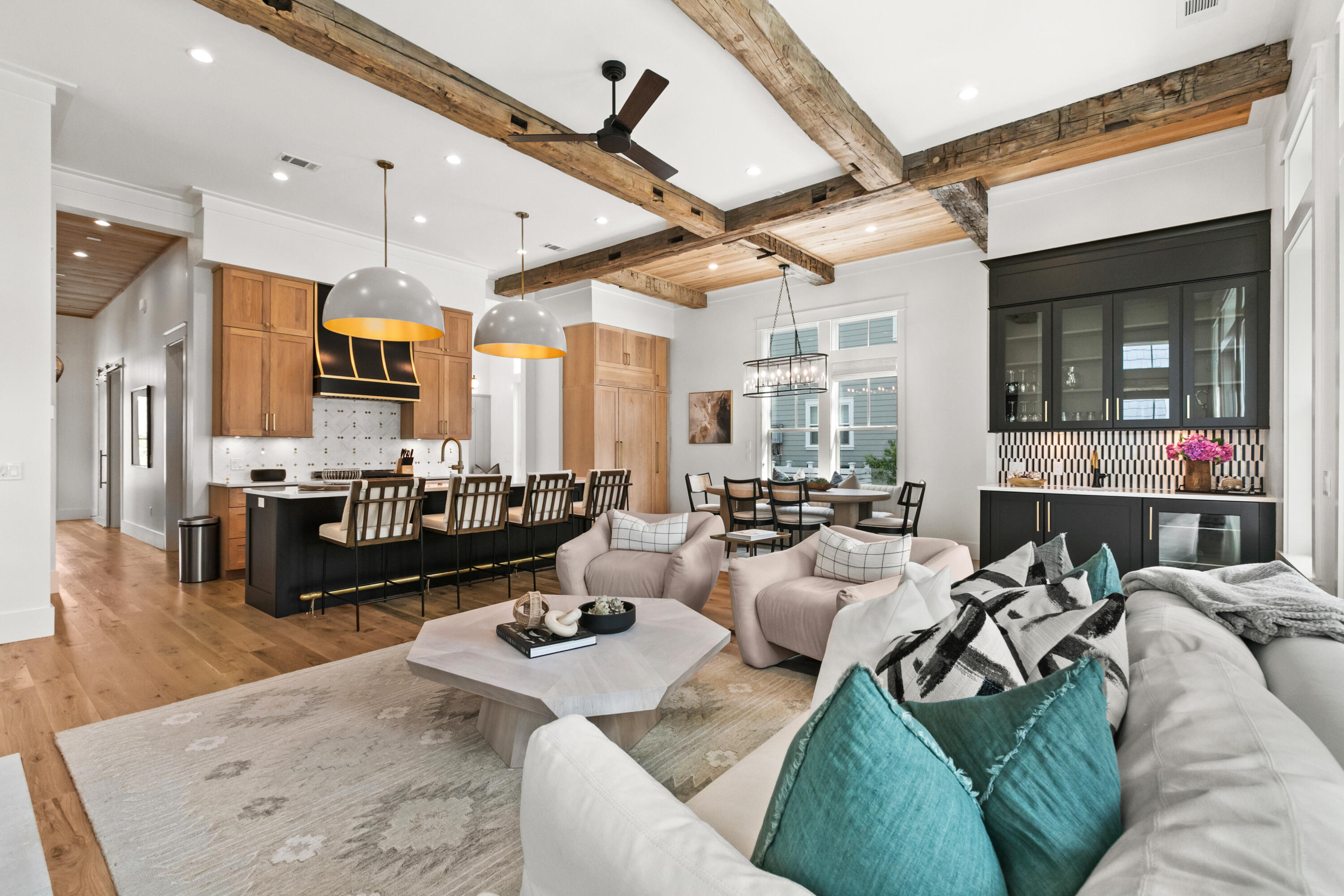 Motivated Seller! Luxury Meets Coastal Living at Sandpiper in WaterColor Crossings. This home is a stunning, fully furnished luxury retreat designed by Dougherty Architecture + Design. Recently completed in the desirable WaterColor Crossings District, this exquisite home offers the perfect blend of modern elegance and relaxed coastal living. Spanning 3,474 square feet, Sandpiper features 4 bedrooms, a bunk room with four built-in queen beds, and 5.5 bathrooms, all enhanced by high-end finishes and custom wood ceiling details throughout. The open-concept kitchen, dining, and great room provide an inviting space for entertaining, complemented by a first-floor bedroom (or study) with an ensuite bath, a powder room, pantry, and mudroom. Step outside to your private heated pool, an outdoor  shower, and expansive porches on both the first and second floors, offering the perfect setting for relaxation or gathering with friends and family. On the second floor, the primary suite features a spa-like ensuite bath with a wet room, while two additional bedrooms, each with ensuite baths, provide ample space for guests. The third floor boasts a spacious media/game room and a custom-built bunk room with four queen beds and a large bathroom. WaterColor offers access to world-class amenities, including the exclusive Beach Club with three Gulf-front pools, Camp WaterColor's lazy river and pools, plus additional pools at Lakehouse, Sand Hill, and Dragonfly Park. Enjoy miles of scenic biking and hiking trails, a championship tennis center, and outdoor adventures like paddleboarding and kayaking at the BoatHouse.Whether you're looking for a high-yield investment property or a luxurious coastal retreat, Sandpiper delivers an unparalleled lifestyle in one of 30A's most sought-after communities. Now is the time to actdon't miss this opportunity! Call today for details and to schedule your private showing.