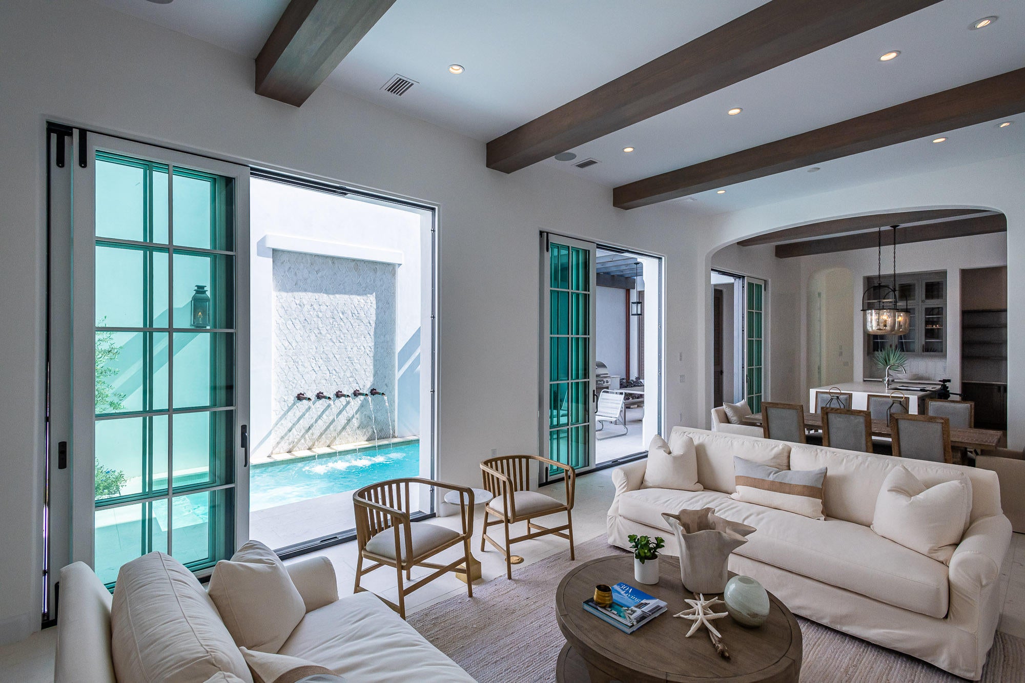 Domin Bock Architecture checked all boxes in the design of 29 S. Charles. Expansive living, generous bedrooms & closets with multiple indoor & outdoor entertaining areas create a soulful environment. Gulf of Mexico views can be taken in from the 2nd level balcony and more so from the 3rd level roof terrace with its own fireplace & conditioned bar & powder room.
Entering at the 1st floor you immediately are captivated by the openness and flow of natural light found in 29 S. Charles having open living, dining, and gourmet kitchen which encapsulates the courtyard with pool & outdoor dining with summer kitchen. Open the 3 sets of slider doors and your outdoor living is fully connected with indoor living.
Ceiling beams define the 1st level spaces mirrored with exquisite artisan Venetian Plaster highlighting the room's details.  The kitchen with butler's pantry features Thermador appliances wrapped in weathered gray cabinetry providing a soft pallet of designer backsplash detail 2nd to none.  The large kitchen island looks out to the courtyard living making for a great area to entertain with the bar having a beverage refrigerator & pellet ice maker.  
29 S. Charles boasts 5 bedrooms with en suite bathrooms and generous closets allow for full time residency.  Each bathroom yields its own magnificent tile work that is timeless and unique to this home.  
The master suite welcomes you with a beautiful, vaulted pecky cypress ceiling detail enhancing the rooms comfort full of pass through natural light.  The master bath features beautiful cabinetry outlining the dual vanities.  Walk-in shower, soaking tub, with a large closet and you will not want to leave.
The guest master has its own balcony looking south with the Gulf of Mexico in sight.  Each of the 3 remaining bedrooms are private with their own bathrooms of which one is on 1st level detailed with milled ship lap wood on the northern bed wall with ceiling beams above.  This property easily allows for two-family living when desired.
This home is aligned on the iconic S. Charles Street with Palmera Park and the Gulf Green beach access steps away.  In addition, the new private, owners Beach Club will open fall 2020 adding more reason to purchase this property. 
Exquisite end to end 29 S. Charles is an amazing, south of 30A home available for purchase inclusive of designer furnishings.