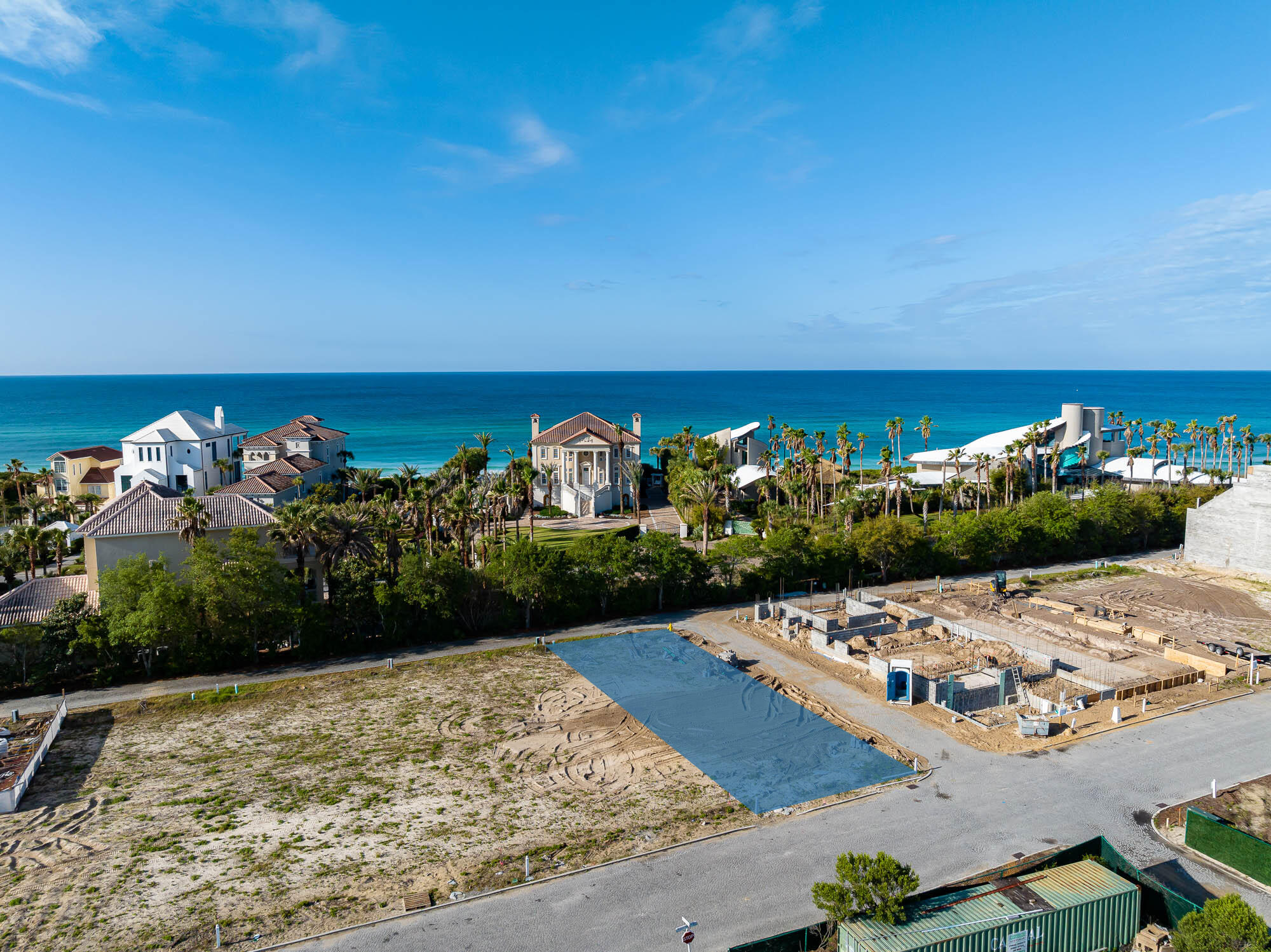 Newly released Custom Homesite UU1 brings to market a unique & welcomed variance to the Alys Beach Design Code.  For the first time ever is an allowed 2 ½ story home build with roof terraces showcasing the Alys Beach roof top architecture & view of the Gulf of Mexico.Homesite UU1 is situated on the corner of Elbow Beach Road and Needle & Thread Alley oriented in a North to South manor capturing East to West sunlight.  This iconic location will satisfy the most design savvy having this corner condition. Design opportunities are endless capturing this homesite's scaling to create beautiful indoor & outdoor elements.  Courtyard pool, 3rd story roof top terrace with summer kitchen for entertaining are only the beginning.  The 3rd story roof terrace will incorporate conditioned living space to connect with the expansive roof terrace. This prestigious homesite is approximately 200 yards from the private owners Beach Club & Restaurant and proximity to any & all amenities and Town Center, pedestrian friendly to all. This is one of the best custom homesites Alys Beach has to offer.