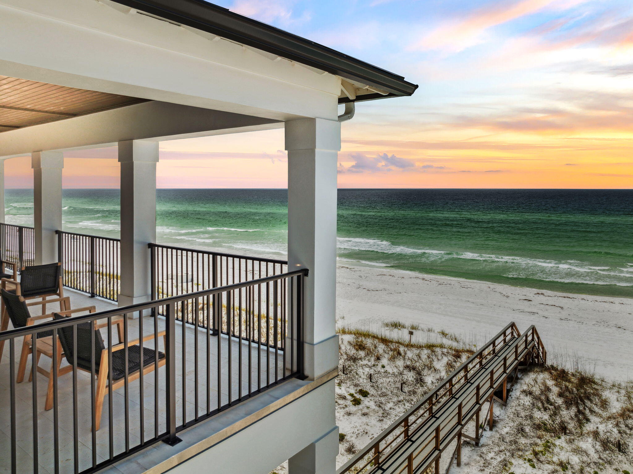 Situated on a prime stretch of Scenic Highway 98, 3464 Scenic is a legacy Gulf-front residence offering 56 feet of linear beachfront and unobstructed views across Destin's eastern coastline. With over 4,600 square feet of interior living and multiple levels of outdoor space, this eight-bedroom estate delivers both scale and flexibility within one of the most coveted beachfront corridors on the Emerald Coast. The home's elevation offers commanding views from all primary living areas, including a 44-foot-long main living room that anchors the open-concept floor-plan. Walls of glass frame the Gulf, while wide balconies and deep porches blur the line between interior and exterior living. The kitchen connects seamlessly to both the dining and living spaces, allowing for uninterrupted sightlines and direct access to the beach-facing deck.

Each of the eight bedrooms is thoughtfully positioned for privacy, with several offering en suite baths and private balconies. The home's layout easily accommodates large families or high-capacity rental groups, supported by multiple gathering spaces, ample storage, and an oversized two-car garage.

The outdoor footprint includes a private beachfront pool, covered lounge areas, and a dune walkover that leads directly to the sandno roads to cross, no steps between you and the shoreline.

With a proven rental history and an irreplaceable Gulf-front lot, 3464 Scenic Highway 98 offers both lifestyle and investment upside in a location that continues to outperform the broader market. Whether held as a private retreat or income-producing asset, this is coastal real estate with staying power.