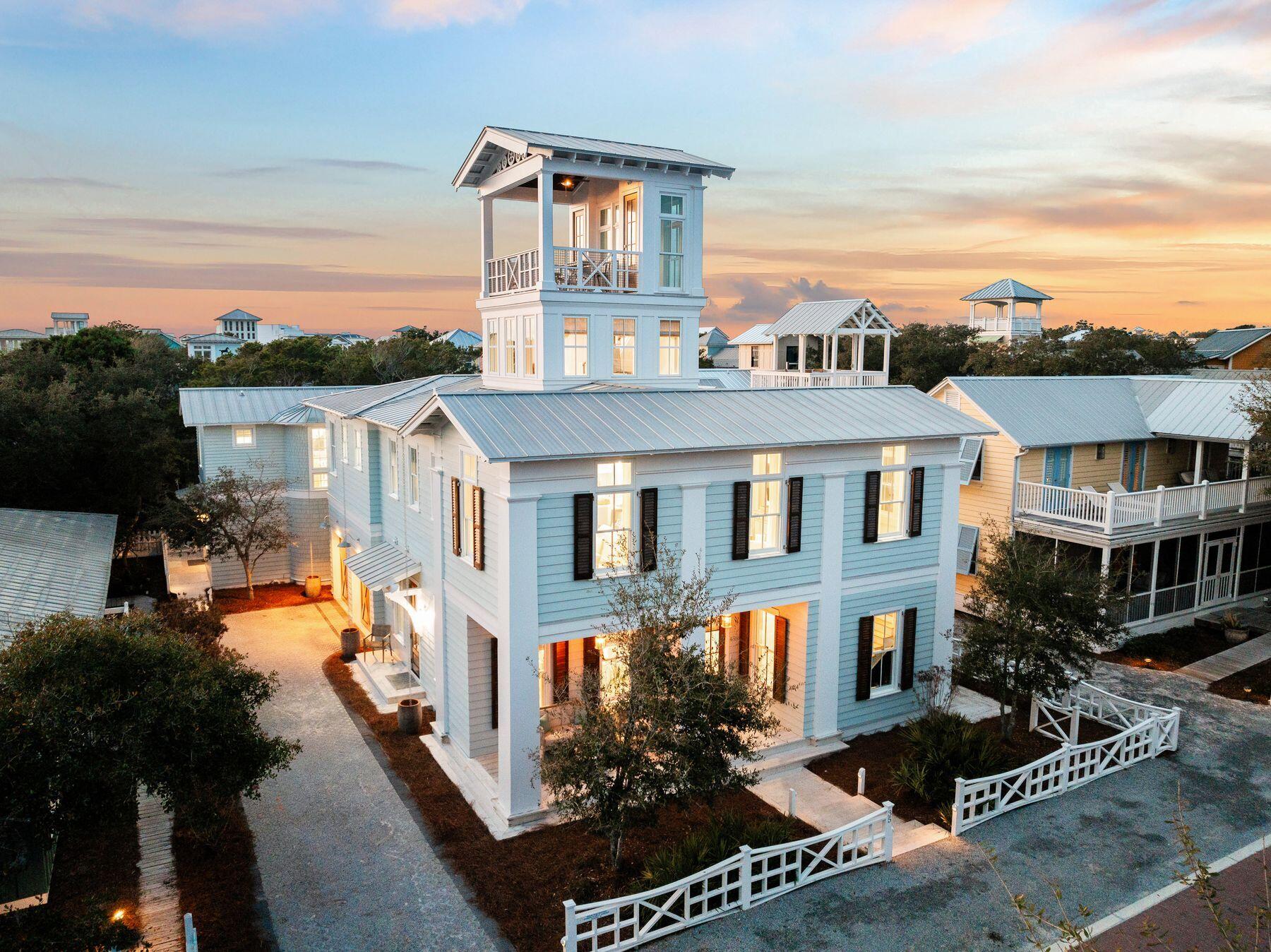 Welcome to the most highly valued location and new home in Seaside, Florida north of 30a with masterpiece views of the Gulf. 

Constructed in 2019 and in 2021, this home represents the direction of the new emerging town. Three lots north of 30a on Tupelo Street, this lot is 60 by 102 feet being among the larger of the more traditional Seaside home sites. 

Of the few homes in Seaside with a pool this home also has an integrated separately plumbed hot tub for relaxing after an active lifestyle day. 

The first floor features a large guest en suite along with the living space, a bunk room and an additional bath. Entertainment easily extends to the courtyard pool. The elevator or stairs take you to the primary living level with a true master chef kitchen. With two sinks and two dishwashers and an entertainer's island, the best of all gatherings can be held here with ease. Dining and living in an open area with extraordinary trim detail and vaulted beamed ceilings are things not found in Seaside in most all homes.  The laundry, office space and primary en suite bedroom and an additional en suite guest bedroom complete the space with a 1/2 bath serving the living area.

Transitioning to the third level quiet tower space for morning news or coffee or relaxing with a good book begins to unveil the substantial views of the gulf. However, there remains the upper level walk out tower deck. 

Captivating views that are among the best that can be achieved await you for another place to have a great cup of coffee or an evening sunset show every day of the year. As if enough, the home also has an 800 square foot Carriage house. The carriage house is 2 bedrooms and 2 and 1/2 baths fully functional home with a great kitchen and washer and dryer. 

There are very few homes in Seaside that have been able to achieve an oversized carriage house in addition to a main home, and going forward, such cottages will be more difficult to construct in Seaside. This is your chance to acquire a legacy home for your family and enjoy it for years to come.   This is among the very few residential homes in Seaside, Florida.