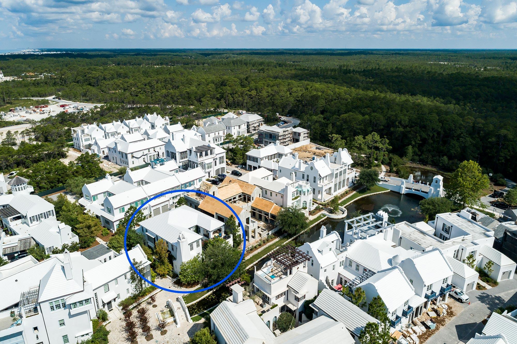 The encapsulated Cherry Orchard arrival to 74 Butterwood Alley from the Lake Marilyn pedestrian bridge is natures coveted entry to this beautiful home. Overlooking the iconic Lake Marilyn of Alys Beach, this incredible home is only 1 of 8 custom homes designed & built within this prestigious lake front setting.
Domin Bock Architecture created a full-time living masterpiece by having the master on the 1st level paired with the gourmet kitchen & expansive living room having double height ceilings creates spaces perfect for entertaining. The 1st floor master lends itself to views of Lake Marilyn which opens to a veranda to enjoy the morning's expresso with the sounds of nature. This property provides 5,035 square feet of conditioned living having 5 bedrooms and 4 -1/2 bathrooms with