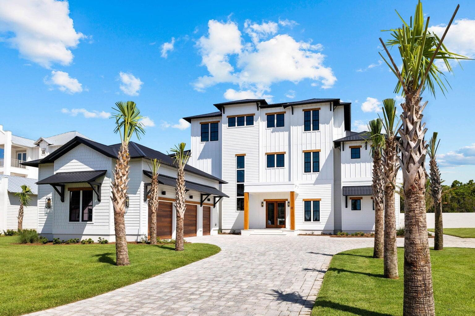 11 Sundew Place is a stunning single-family residence located in Watersound Camp Creek, Inlet Beach, Florida. This newly constructed home, built in 2024, boasts a spacious 6,121 square feet of living space, featuring 5 bedrooms, 7 bathrooms (5 full and 2 half), and a Craftsman-style architectural design. The property sits on a generous 0.57-acre lot and includes a private pool, a two-car attached garage, and additional open parking spaces.  The lot offers enough space to add an additional garage and carriage house.  
Living in Watersound Camp Creek offers a lifestyle of luxury and convenience. The community provides access to amenities such as a beach, exercise room, golf facilities, tennis courts, a playground, and a resort style pool. The area is known for its serene environment, Home is being sold unfurnished.