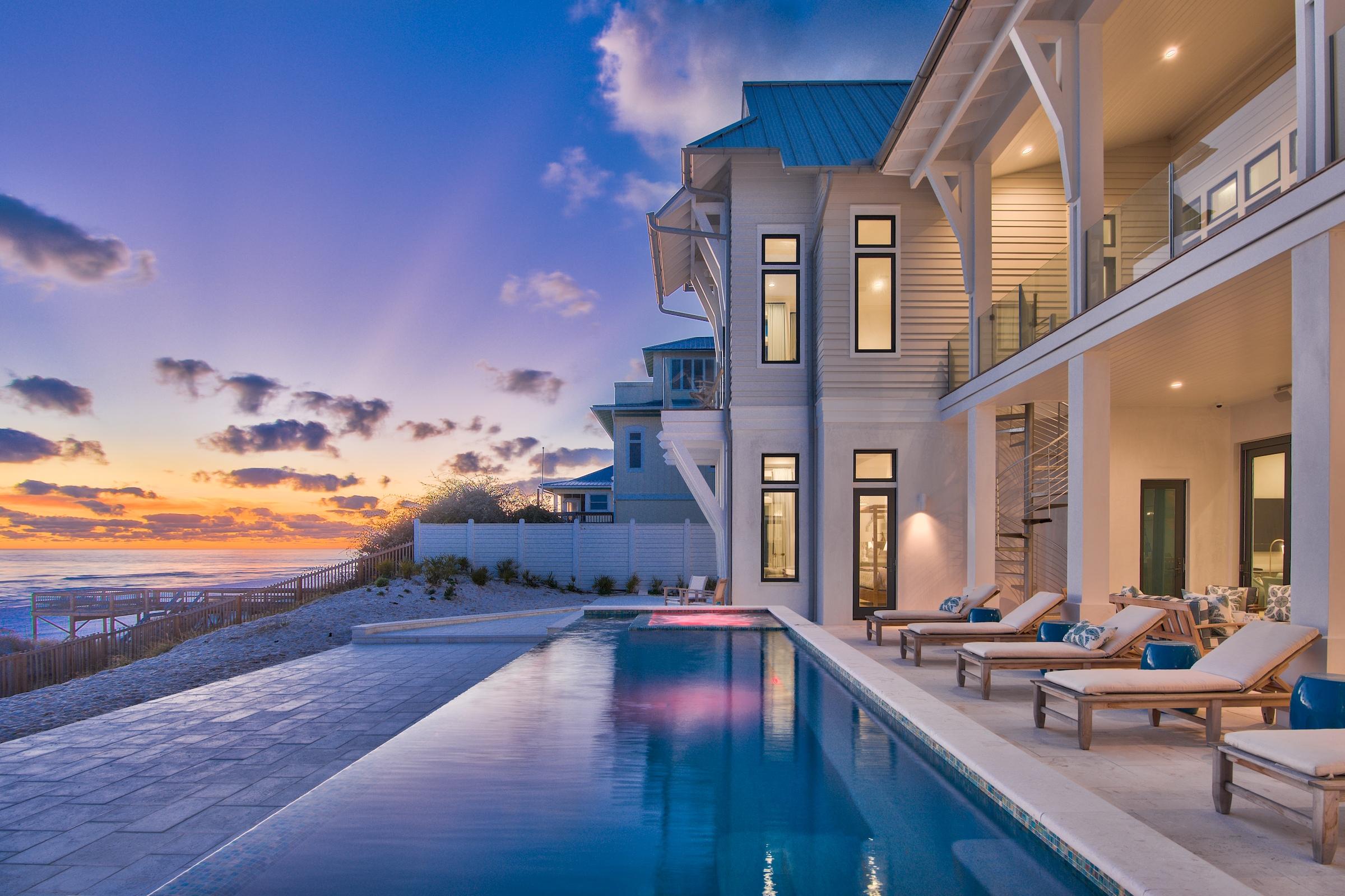 Located in SANTA ROSA BEACH FLORIDA along Scenic Hwy 30-A, this stunning Gulf-front home includes ten bedrooms, nine full bathrooms, and four half baths. Newly constructed in 2019, with a sprawling 8,985 square feet of air-conditioned living space, this premier property sits on 0.475 acres of land and boasts 100 linear feet of pristine beach frontage. Six of the ten bedrooms are located directly on the Gulf of Mexico, each with a private bath and direct access to a balcony providing the opportunity to take in the view and enjoy the warm sea breeze. Three separate bunkrooms and a guest house with an additional bedroom add up to sleeping quarters for 28 people. Expansive balconies on two levels, an outdoor kitchen, an infinity-edge pool, and a spa are all just steps away from the white sandy beaches uniquely found in the Panhandle of Florida. Stunning views immediately welcome you as you step through the door into a spectacular great room with reclaimed wood beams, Venetian plaster walls, and a gas fireplace. The chef's kitchen includes a gas range, wine refrigerator, a large island, and of course, breathtaking views. Make your way upstairs from one of two staircases located on the east and west corners of the home or take the elevator included for your convenience. A separate living area with a kitchenette, four Gulf-front bedrooms with private baths and direct access to a private balcony or the large covered porch awaits. Additionally, there are two bunkrooms, each with a private bathroom. Make your way to the third floor where you will find a beautiful, light-filled She Shed and a billiard room. The gated estate includes a three-car carriage house, with a separate kitchen, great room, bedroom, bath, and a bunk room. The area is served by Panama City Beach & Fort Walton/Destin airports with commercial service and FBO facilities. All information is believed to be accurate but should be verified.