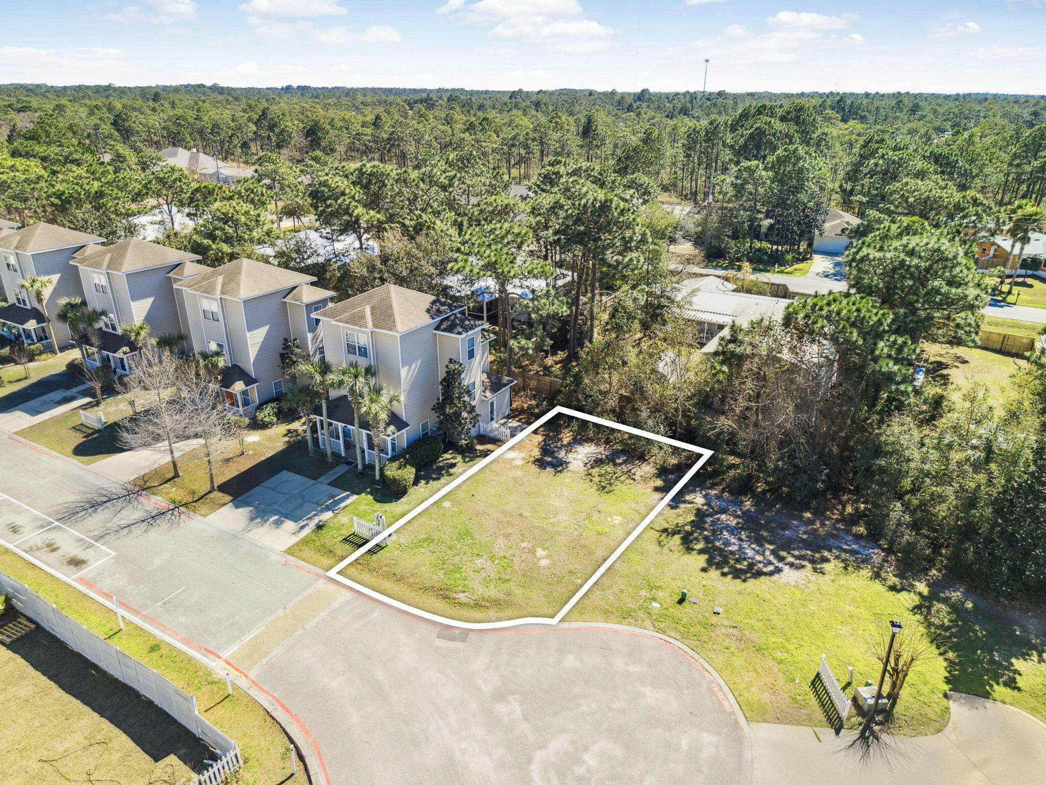 Build your dream home in Enchanted Estates, a thoughtfully planned community known for its peaceful setting and convenient location. Surrounded by natural beauty and established homes, the community features inviting green spaces, walking paths, and a private pool with clubhouse for residents to enjoy.
This centrally located homesite places you within easy reach of our white sand beaches and coastal lifestyle , while also offering quick access to Grand Boulevard's shopping, dining, and entertainment, Sacred Heart Hospital, and the many attractions of Sandestin, Destin and Scenic Highway 30A. With low HOA dues and flexible building timelines, this homesite presents an exceptional opportunity to create a full-time residence or second home in one of Santa Rosa Beach's most desirable areas.