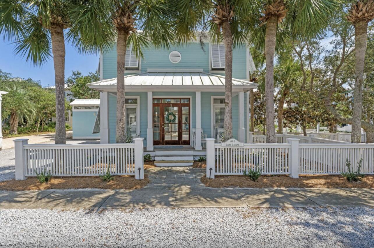 What a location! This guest house faces Dunecrest, but there is room for a main house that will face Beachside Drive. This lot is right in front of beach walk over #4 with ample parking. This home is as near to beach front as possible. 

Lazy Lizard at Carillon Beach is a remodeled two bedroom two bath just steps to the beach. This property is considered a guest house, with a rare large FULLY fenced yard with an inviting outdoor pavilion. There is even room to build a main house towards the front of the lot. With an efficient floor plan, the home lives larger than the square footage. The location and remodeled interior are hard to beat. Do not miss your chance to own in Carillon Beach!