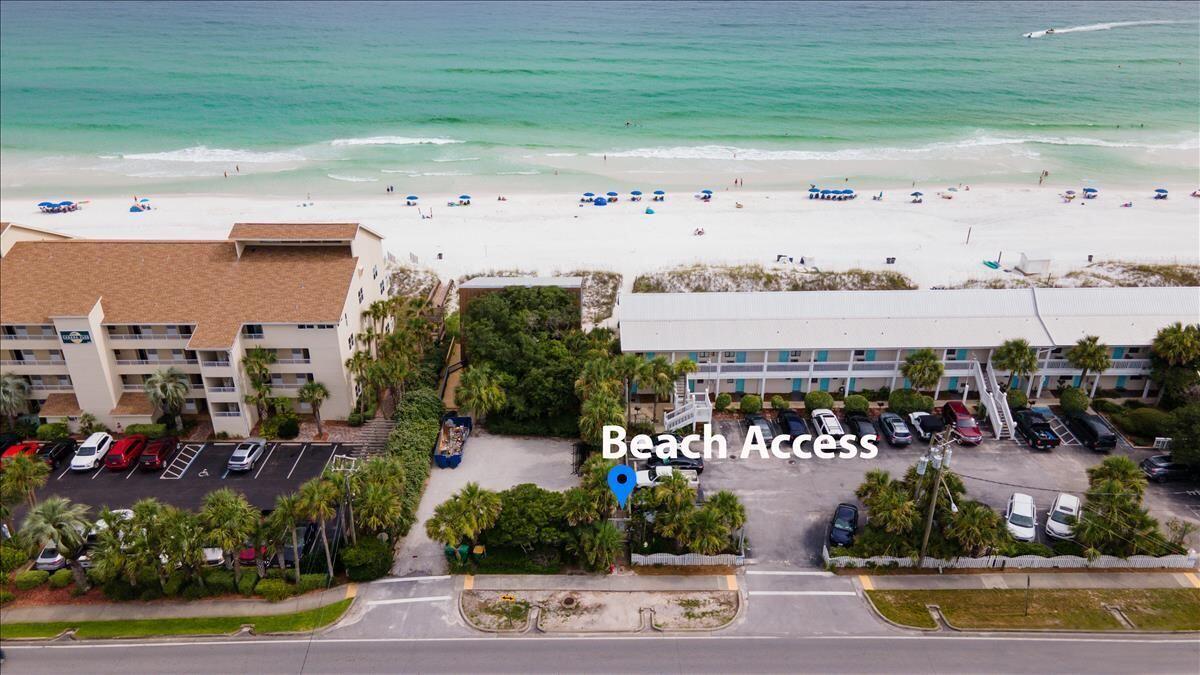under contract with 72 hour kick out clause 
BEACH ACCESS ACROSS THE STREET!  Nothing has been overlooked in this fantastic three-story Florida Beach House with unbeatable Gulf views! The main house boasts 5 bedrooms including two master suites and six baths. Each bedroom has its own bath. Both master baths feature huge spa bathtubs and separate walk-in tiled showers with rain showerheads. The gourmet kitchen has granite countertops, custom cabinetry and stainless appliances. The downstairs activity room, which includes a mini kitchen, bar and full bath could also be used as another bedroom to maximize your rental income. Enjoy the spacious wrap around balconies for lounging and your very own pool for relaxing! This home has so much to offer including custom tile flooring, custom cabinetry, crown moldings, wet bars,an elevator, two car garage and the list goes on! The Carriage house, separated by the pool deck, has one bedroom and a full bath with a fully equipped kitchenette as well. You can laze around your private pool, great for cooling off from sunbathing or coming in from the beautiful beaches of Destin which is directly across the street. Do not miss this magnificent home with gulf views! Buyer to verify all information.  Don't forget the best part, directly across the street are the sugar white beaches and emerald green waters of the Gulf! Truly a must see for the beach lovers! Perfectly paradise!