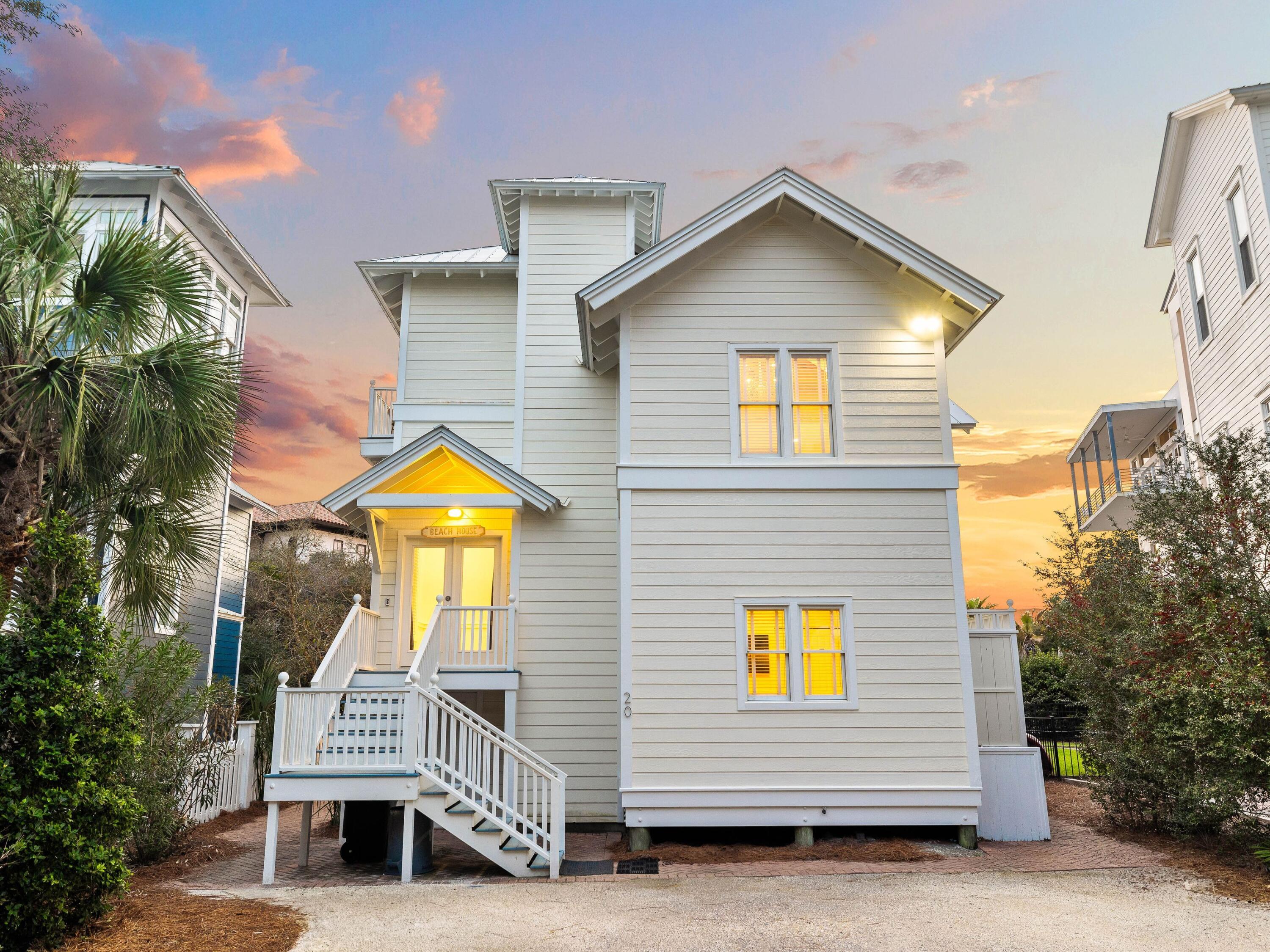 Nestled just south of 30A, this beachside home offers direct access to the adjacent beach boardwalk and a private pool area, making it a prime location for coastal living. While the home has been remodeled with custom finishes and curated light fixtures, it retains a relaxed, lived-in charm. The designer kitchen stands out with pecky cypress cabinetry, quartz countertops, and premium appliances, complementing the inviting living spaces.

The functional floor plan includes two first-floor bedrooms, two full bathrooms, a laundry area, and easy outdoor access. The second level serves as the central gathering space, featuring an open-concept living, dining, and kitchen area with vaulted cypress ceilings, a gas fireplace, and abundant natural light. The third-floor suite offers a private deck with stunning southwestern Gulf viewsperfect for enjoying the sunsets.

A new elevator enhances accessibility to all levels, and with ample storage and parking, the home is conveniently located just minutes from Seaside and WaterColor, providing easy access to boutique shopping, dining, and entertainment. Whether you're looking for a rental investment or a personal coastal retreat, this property offers the essence of 30A living with a blend of charm and possibility.