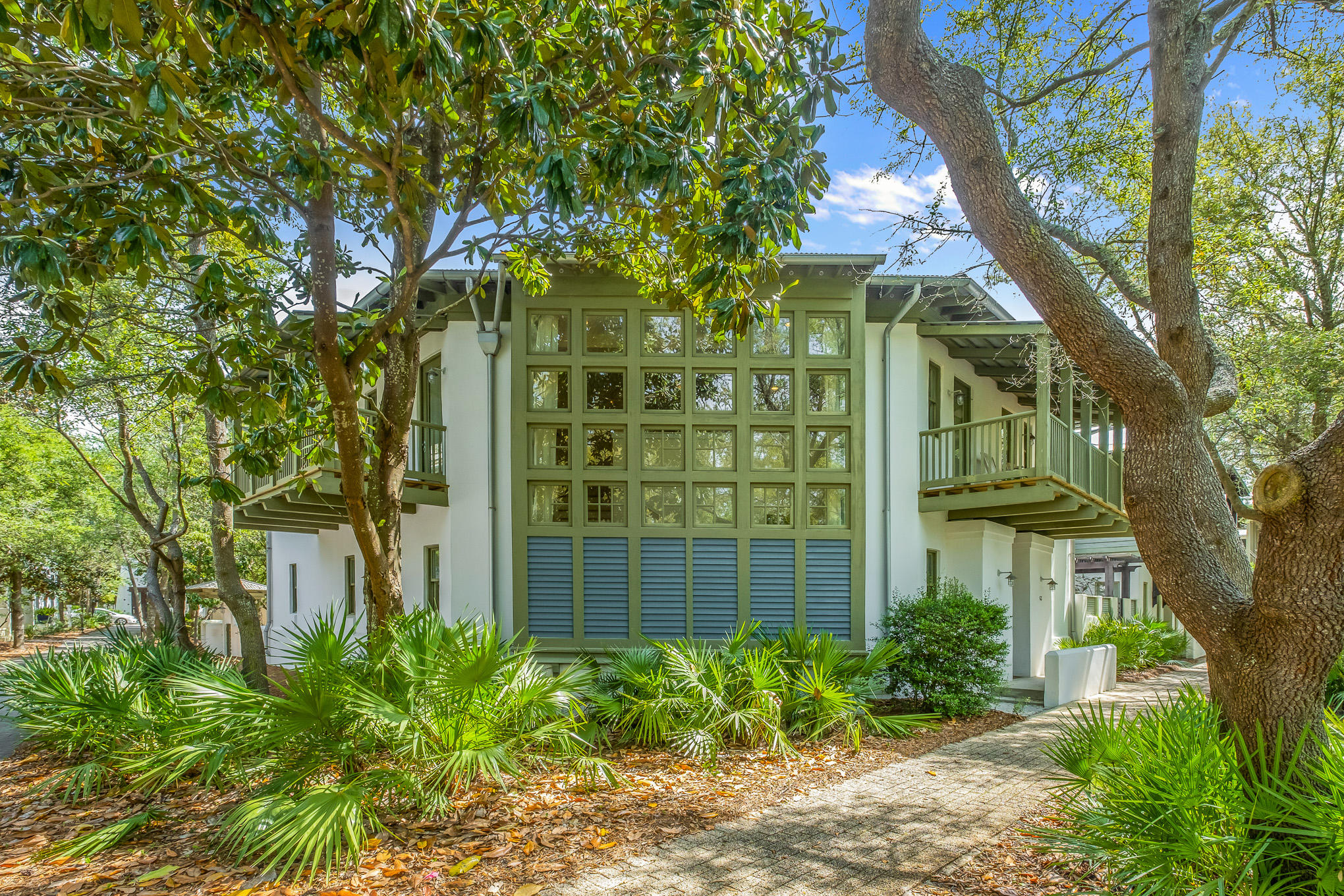 Don't miss the opportunity to own one of the most unique and tranquil properties in Rosemary Beach. The home has never been on the market; Built and owned by one family. Located in the heart of Rosemary, facing the E Long Green Park.

The kitchen and main family room are located on the first floor, in addition to a powder bath, spacious laundry room, and queen guest room.
This home offers 3 bedrooms, 3.5 baths, and two indoor living spaces. You will be spending most of your time on one of the four porches or outside in the courtyard.  

Floor to ceiling windows fill the first and second floor living areas with natural light and a beautiful view of Rosemary's well know Green and art installation. 
The property has ample amount of space to build a carriage house or pool.