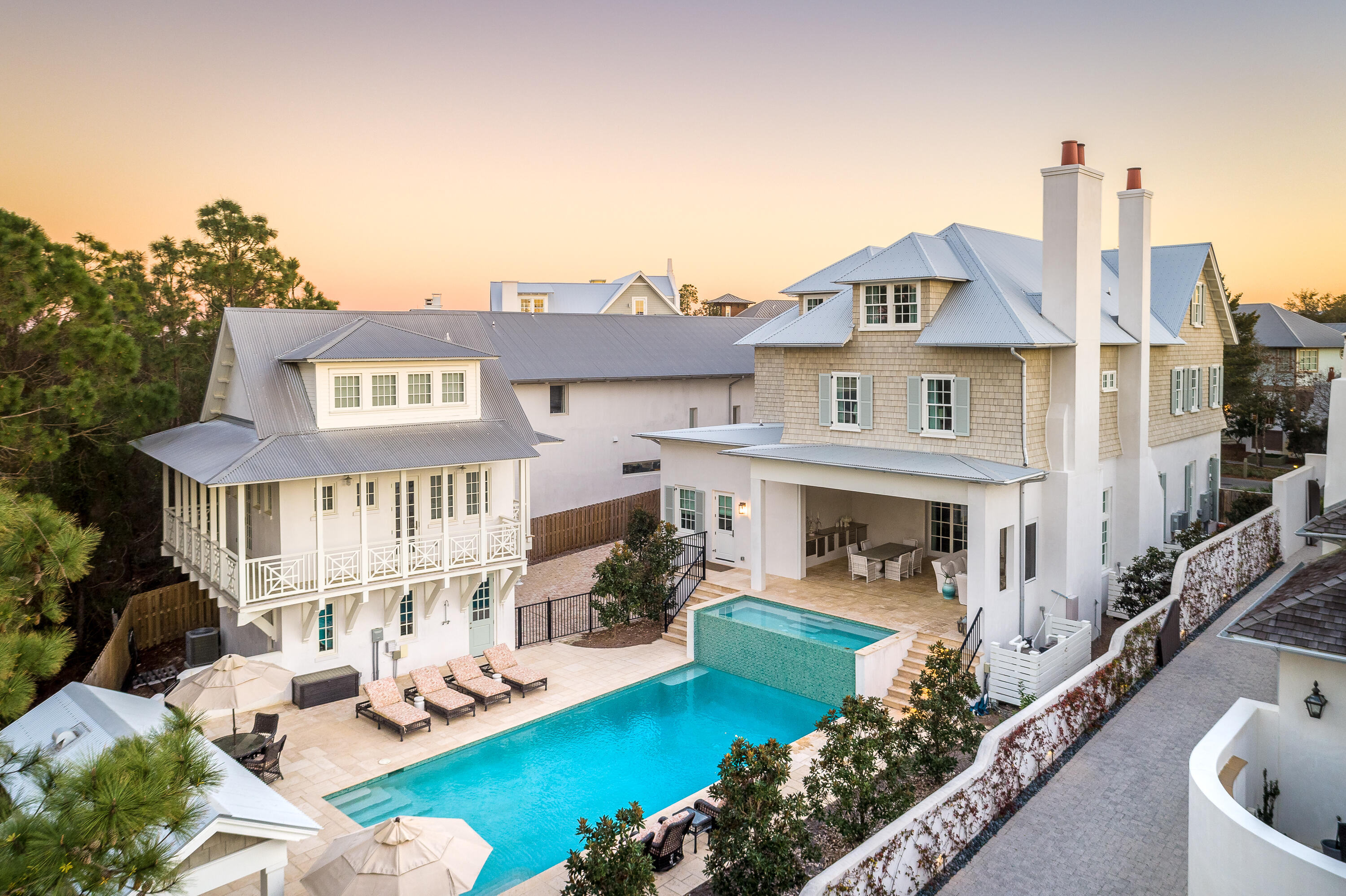 Exceptional in its beauty, luxury, and serenity, 68 West Kingston is a breathtaking property in 30A's most storied community. 

Artfully designed with Wolf and Subzero appliances, a butler's pantry, two wet bars, a master bedroom breakfast bar, spectacular master closets, a theater room/fitness room, and a spacious third-floor recreation room - one of three gathering spaces across the home's generously appointed three levels. 

The attention to detail is evident in its exceptional tile selections, custom cabinetry, natural quartz countertops and Venetian plaster walls throughout the home's first floor. This Stan Benecki-commissioned residence evokes feelings of relaxed elegance that truly epitomizes the 30A lifestyle. 68 West Kingston is an oasis of tranquility that was designed for entertaining. Reclaimed ceiling beams in the living area direct the eye to a beautiful veranda which overlooks arguably one of the largest pools in Rosemary Beach and superb outdoor living spaces that were made for year-round gatherings.

Drawing influence from Rosemary Beach's Dutch Caribbean colonial architecture and improving upon it with timeless lines and color, the home is impressive upon approach. 

Even more impressive, though, is what greets the visitor on entry.  A grand oval vestibule connects to a superbly decorated light-filled formal dining room; and opposite it, a sublimely designed study. Continuing through the home's central corridor reveals the main living area that is grand in size yet thoughtful in scale. 

Venetian plaster walls, custom cabinetry, a fireplace - one of 3 throughout the residence, elegant furnishings and window treatments appointed by Maison Studios invite guests to congregate and relax.   

Alluring space and comfort are what sets this home's master suite apart from others. A pecky cypress ceiling and a gas burning hearth combine with a spa-style bathroom and oversized walk-in closets to give owners a master retreat styled in serenity and comfort.

European white oak is found throughout the second floor, including a 15'x22' sitting area connecting the second floor's 3 bedrooms.  

The house's 3rd floor adds 2 more bedrooms, cavernous finished storage, and expansive recreation areas offering an ideal location for family game nights or a cozy home theatre experience.  

The property's carriage house offers 770 more square feet of living area, across a main floor and a loft bedroom allowing for guest privacy in a comfortable oversized lockout apartment. 

68 West Kingston is the perfect blend of sophistication and relaxed coastal elegance. This residence is ideal for those wanting to be in Rosemary Beach while enjoying the privacy this extraordinary estate affords.

Showings by appointment only.