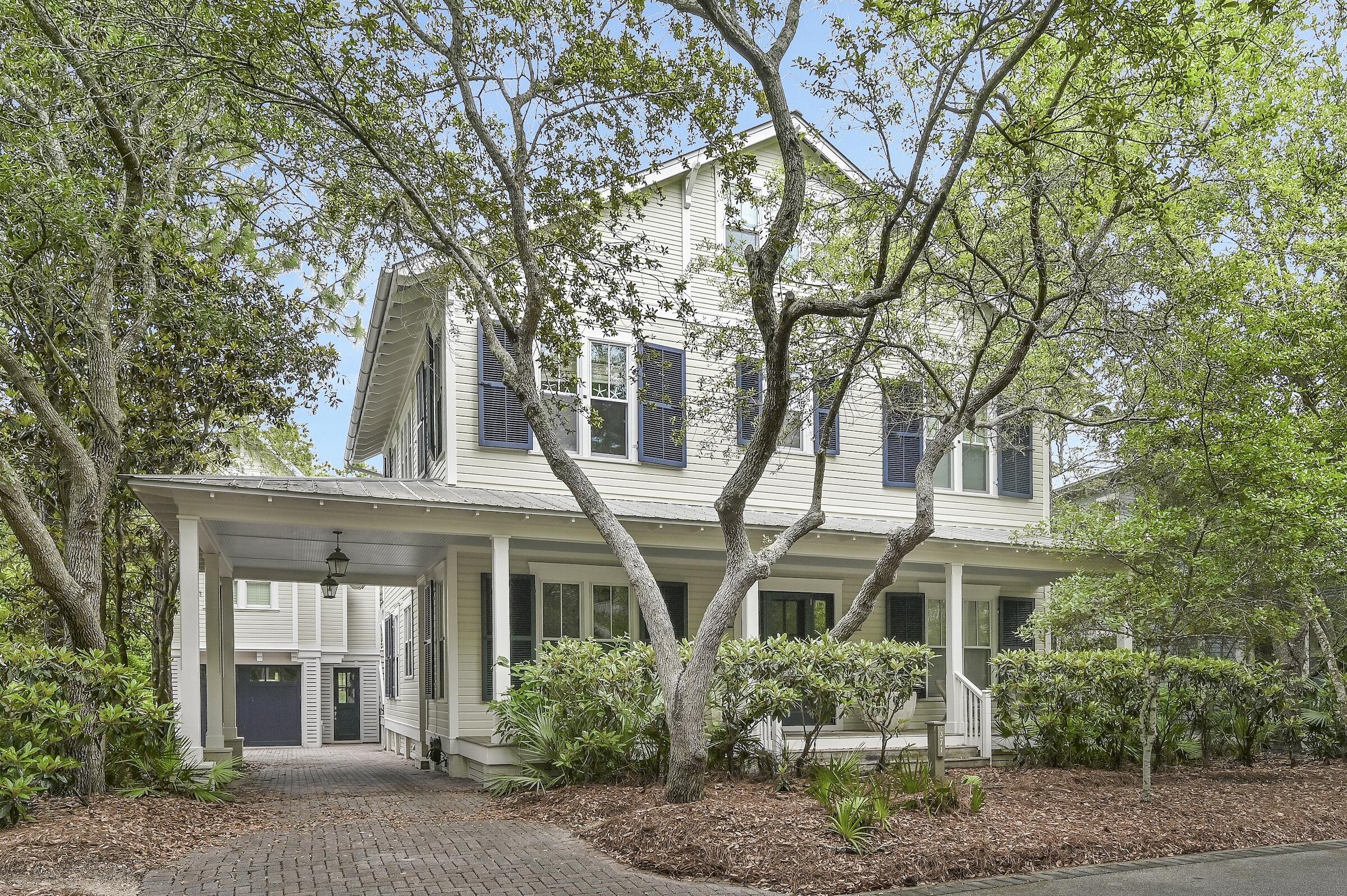 This luxurious home located in the premier location of WaterColor boasts stunning lake views and plenty of space to add a large pool and outdoor kitchen if desired. It is ideal for entertaining and has recently been updated with fresh paint, new furniture, and remodeled kitchen and bathrooms. The main home offers three bedroom suites, a home office/bunkroom, a TV den, a laundry room, and four full bathrooms on the first level. The second floor has an open living/kitchen/dining area, the master suite, and another full bathroom. The third floor is perfect for an extra bedroom, playroom, or media room. The 1.5-car garage is attached to a 1.5-story carriage house with a full kitchen. The two buildings are surrounded by lush landscaping and a patio, making this home a great rental opportunity. WaterColor's amenities provide the perfect blend of natural beauty, a beach club, five additional pools, tennis/pickle ball center, miles of biking trails, fishing, kayaking, and easy access to all of 30A.
Walk, bike, or golf cart to Seaside, WaterColor or Grayton Beach, where you can shop at quaint boutiques, dine al fresco at award-winning restaurants or play outdoors in the gorgeous green spaces. Feeling more adventurous? Use your paddle boards or kayaks and explore the open waters of the Gulf or Western Lake. This prime location allows you to experience the beauty of Florida's Emerald Coast! Let "Our 30A Hideaway" become your family's gathering place for weekends, holidays, and the summer season or your additional stream of investment revenue.