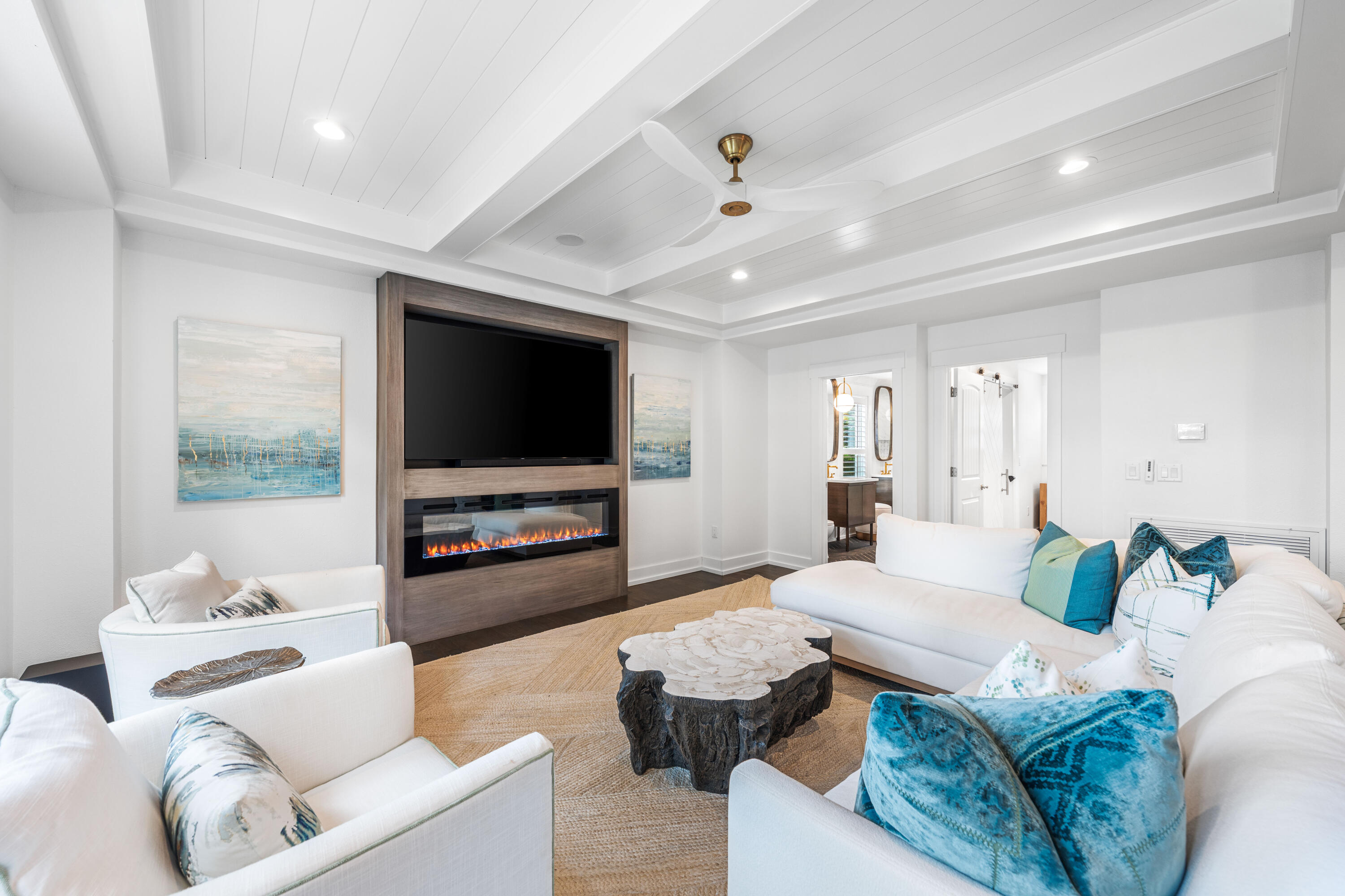 Renovated Waterfront Masterpiece! Perched on the peaceful waters of Eastern Lake with panoramic views extending to the Gulf, 105 Trae Lane is a true sanctuary with four bedrooms, four bathrooms, and 3,525 square feet of meticulously curated interiors. Spanning four levels featuring elevated craftsmanship, this exceptional residence was completely reimagined in 2022 and offers a rare combination of privacy, waterfront views, and modern sophistication.
Inside, no detail has been overlooked. A chef's kitchen is outfitted with top-of-the-line Sub-Zero and Wolf appliances, dual dishwashers, and two ice makers—one is commercial-grade making entertaining effortless. Custom cabinetry with integrated lighting enhances every corner of the home, while other premium features add the touches of coastal creativity. The home's layout includes multiple living spaces and an expansive screened porch, all thoughtfully oriented to maximize views and natural light. Motorized power blinds for the windows on the main level, 100% LED lighting, and two new A/C and furnace units ensure year-round comfort, while a standby natural gas generator, tankless water heater, and state-of-the-art camera and alarm system provide peace of mind.

With two washers and dryers, two climate-controlled garages with additional storage, and thoughtful touches throughout, the home is perfectly equipped for effortless everyday living or multigenerational escapes. This meticulously maintained residence has had only two owners, has never been rented, and remains in pristine condition.
Outdoors, the lifestyle continues with a private boat dock, featuring a covered 5,000-lb boat lift and floating dock ideal for launching kayaks and paddleboards directly into Eastern Lake. From there, cruise straight to the Gulf or explore the serene natural surroundings this unique lakefront location affords.