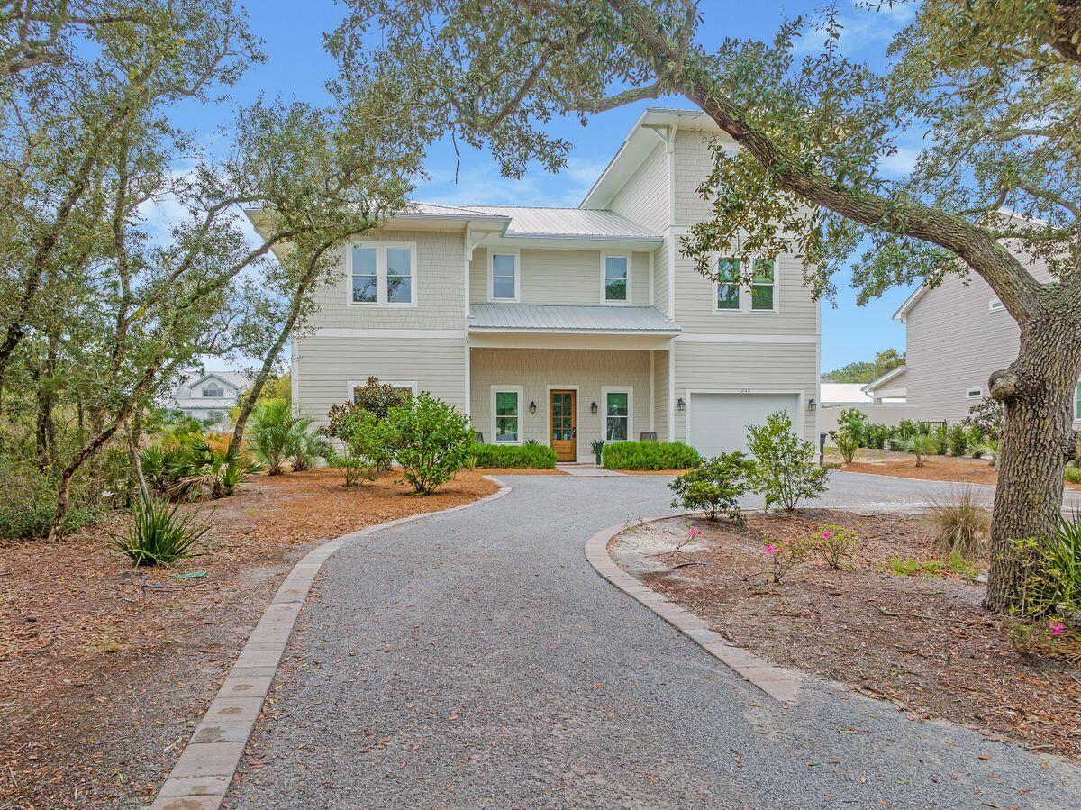Built in 2019, this beautiful beach home is situated on a massive half-acre lot that has ample privacy and captures stunning gulf vistas from the top floor. The community of Gulf Pines presided over one of the quietest and most private beaches in the area and has surprisingly low HOA fees of only $300 annually. This contemporary 2019 beach house has space to spread out and enjoy the Florida lifestyle. The private southwest-facing yard has an enviable 18-ft. by 35-ft. private pool with overflow spa and a shallow tanning ledge for relaxing. Stretching over 100 feet, there's still ample space to add a carriage house which would truly maximize the rental potential of this home. The summer kitchen is kitted out with a stainless steel grill, commercial ice maker, and wet bar, providing an amazing space for entertaining and relaxing poolside. Step through the mahogany front door and enter this superior home, enhanced by wood flooring, soaring ceilings, and ample natural daylight. The spacious open floor plan includes two entertainment/living areas on the main floor and a generous media room on the second floor. Chefs and those who enjoy entertaining will be enamored with the magnificent kitchen. It boasts an oversized island for informal meals or serving canapes and cocktails before dinner. Two dishwashers, twin ovens and two prep sinks are complemented by a full range of high-end appliances. A series of balconies and terraces on all four levels provide elevated views of the pool and make the perfect place for gathering at sunsets. Guests and house parties are no problem with six well-planned bedrooms including an additional bunk room fitted for eight, and two additional guest suites on the third floor. The master suite enjoys a prime first-floor location. It has a luxury bathroom with a standalone soaker tub and a sliding glass door with direct access to the pool for an early morning dip. Located south of Highway 98 in the peaceful Gulf Pines community in Miramar Beach, this property is a real gem. It's located within a five-minute drive of the world-class shopping and dining offered at the Sandestin Outlets, Baytowne Wharf and Grand Boulevard shopping complexes. Deeded access to the uncrowded beach makes it ideal for vacation rentals or as a primary or second home.