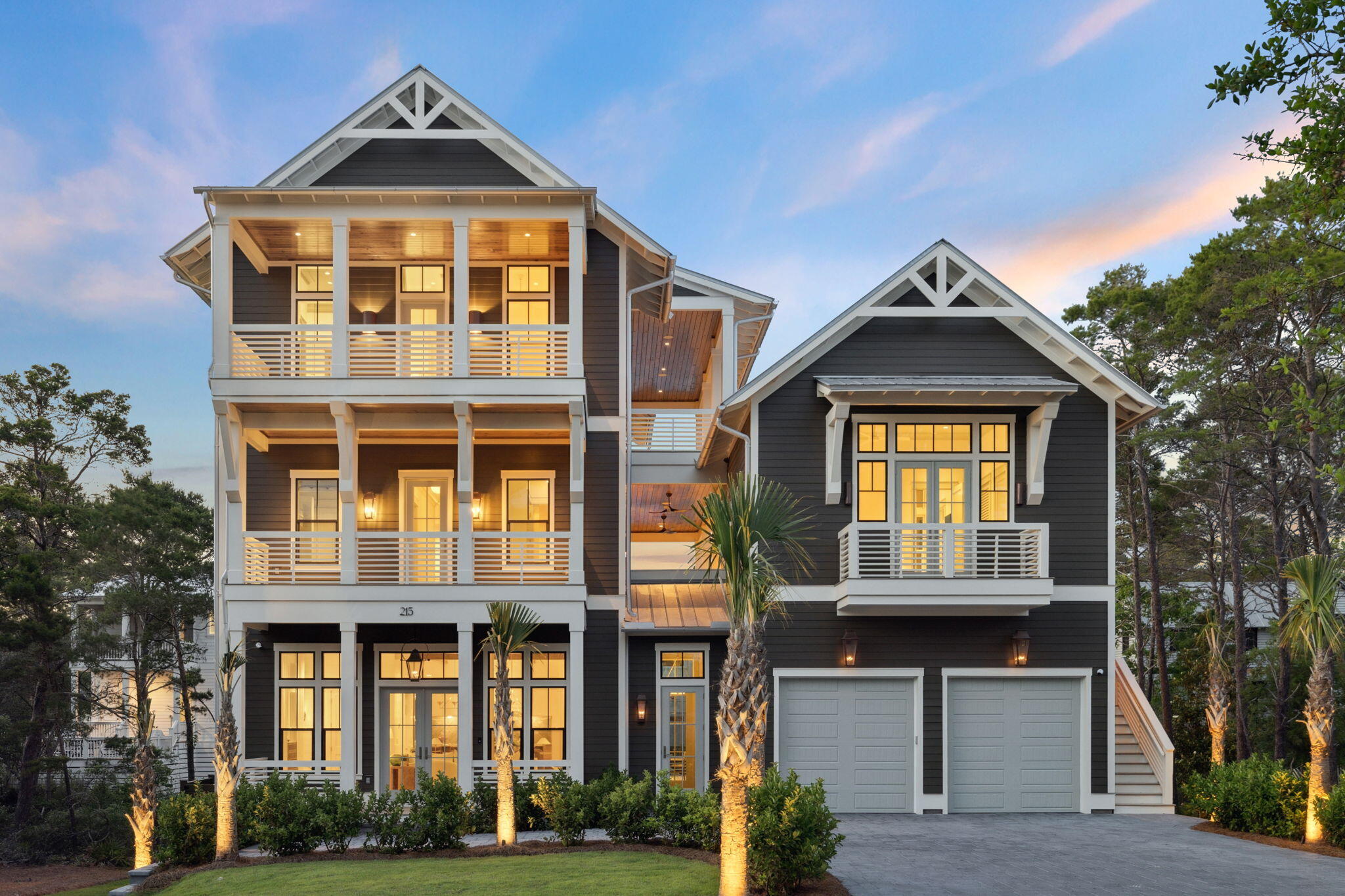 South of 30A Coastal Elegance | Custom-Built Luxury with Pool, Carriage House & Steps to the Beach
Experience the perfect blend of coastal luxury and refined craftsmanship in this stunning new custom home located south of 30A, just a short walk from the sugar-white sands and emerald waters of the Gulf. Thoughtfully designed with entertaining and relaxation in mind, this residence offers high-end finishes and seamless indoor-outdoor living.
Step inside to soaring 12-foot ceilings, boxed beams, and European white oak flooring throughout. The open-concept living space flows effortlessly to the private saltwater pool, summer kitchen, and covered outdoor living area—perfect for gathering with family and friends. The gourmet kitchen is a chef's dream, featuring Alexandria Quart lcountertops, Custom Covered Bridge white oak cabinetry, a wet bar, wine cooler, ice machine, Thermador appliances, and a spacious butler's pantry. A bonus room on the main level offers flexible use as a home office or additional guest bedroom. Ride the elevator to the second floor where you'll find a secondary living area with mini fridge and ice maker, a luxurious primary suite with soaking tub, double vanities, walk-in shower, and large walk-in closet, plus a custom bunk room with ensuite and a spacious laundry room.
The third floor features three generous bedrooms, each with ensuite baths, walk-in closets, and soaring ceilings. A second laundry area adds convenience for guests or large families.

The private carriage house is ideal for guests or rental income, offering a full kitchen, living area, bedroom, and bathroom with independent access or a connection via the second-floor porch.

Every detail of this home speaks to timeless coastal elegance and top-tier design, making it a rare find in one of 30A's most coveted locations.