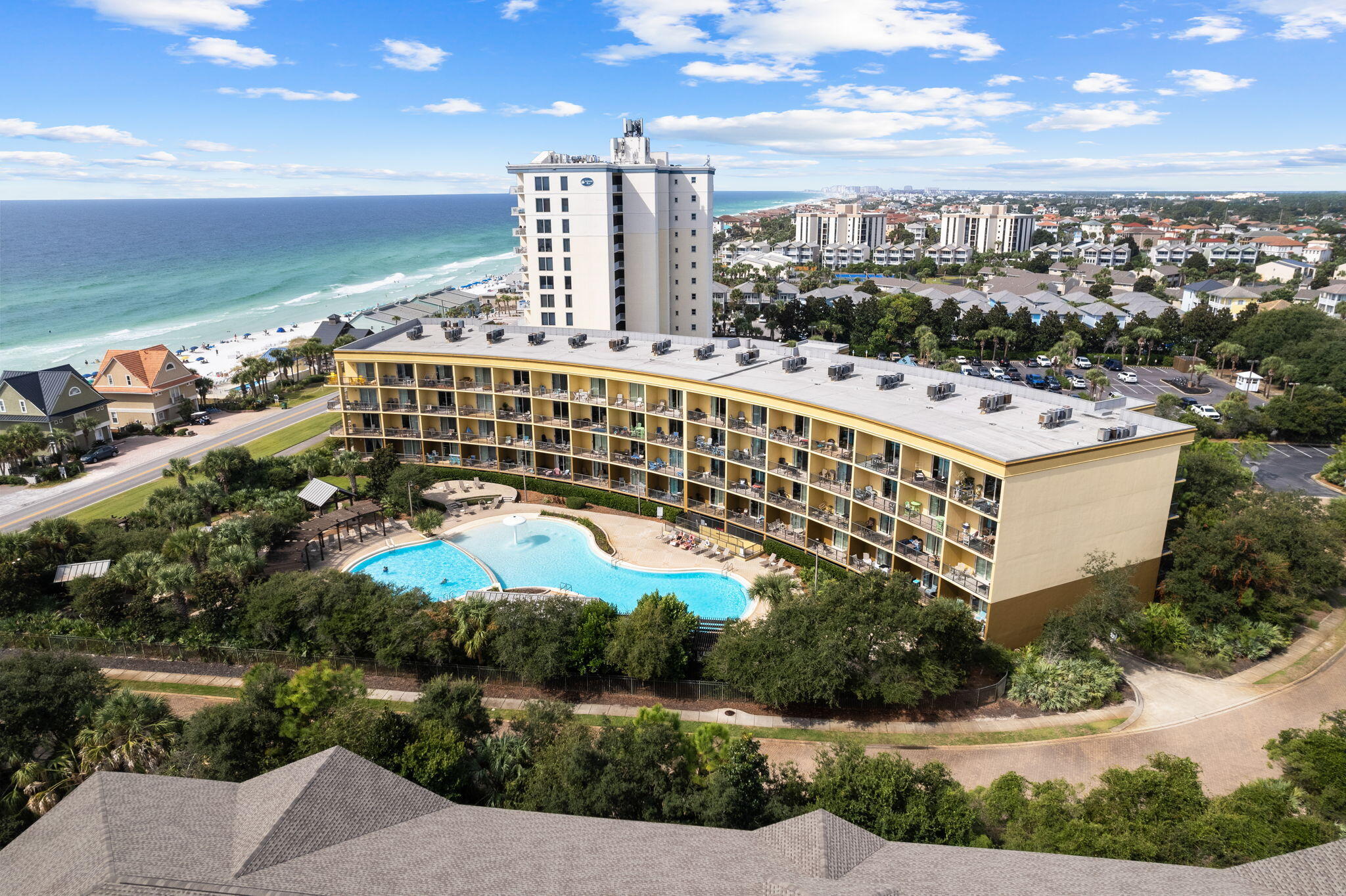 Freshly painted interior! So close to the beach, this second floor Beach Resort condo has much to offer. In addition to 300 feet of deeded beach access across the street, this community has two pools (one seasonally heated), hot tub and an assigned, underground parking space in the gated garage. The second bedroom is bunks set off of the hallway with direct access to a full bath. Spacious living area and large balcony space with peekaboo gulf views give you everything you need and more for a second home or investment property.
