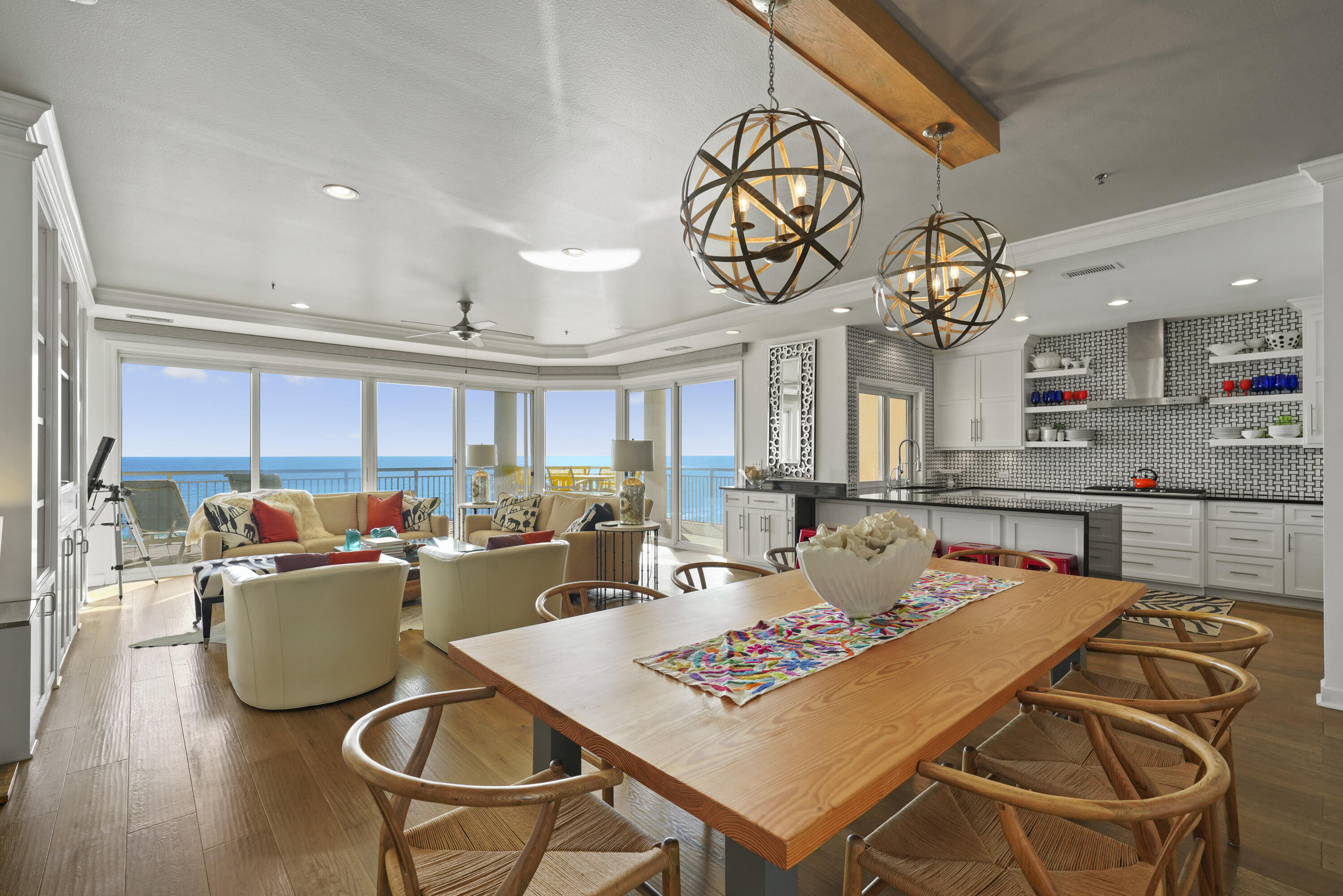*** PRIVATE NON-RENTAL ***BUILDING PANORAMIC VIEWS*** LUXURY 4/4 GULF FRONT CONDO***RARE OPPORTUNITY ON THE 3RD FLOOR IN THE COVETED 10 STACK OVERLOOKING THE DUNES AND GULF***EXPANSIVE WRAP-AROUND BALCONY WITH PERSONAL BUILT-IN GAS GRILL ***RARELY DO THESE EXQUISITE HIGHLY COVETED, PRIVATE, GRAND VILLAS RESIDENCES COME ON THE MARKET. THE GRAND VILLAS BUILDING IS TRUE QUALITY AT ITS FINEST! GRAND VILLAS IS A NON-RENTAL BUILDING PROVIDING PRIVACY AND SECURITY WITH A SEPARATE SECURITY GATE, PARKING, AND PRIVATE AMENITIES INCLUDING A PRIVATE GULF-FRONT POOL AND SPA SURROUNDED BY EXPANSIVE DECKS WITH AN ENTERTAINMENT BAR COMPLETE WITH ICE-MAKER   A CONVENIENT SHORT BOARDWALK LEADS DIRECTLY TO THE PRIVATE DEEDED BEACH WITH CHAIR AND UMBRELLA SERVICE WAITING FOR YOU. THIS NON-RENTAL COMMUNITY INCLUDES PRIVATE SECURITY AND A FITNESS CENTER. THERE IS ALSO A GRAND VILLAS COMMUNITY LOBBY/GAME ROOM AND LAKESIDE FIREPIT AVAILABLE FOR YOUR SOCIAL EVENTS. NEVER WORRY ABOUT PARKING---YOU WILL ENJOY THE PRIVATE, COVERED, PARKING FOR GRAND VILLAS RESIDENTS ONLY. EACH UNIT IS ALLOWED ONE CAR PER BEDROOM. UPDATED PROFESSIONAL PHOTOS COMING SOON.

AS YOU ENTER THE FOYER THERE IS A LARGE SEPARATE DEN/BEDROOM THAT CAN BE USED IN MANY DIFFERENT WAYS. ONCE INSIDE THE HOME, THE VERY FIRST THING YOU SEE IS THE SPECTACULAR GULF VIEWS WELCOMING YOU TO THIS LOVELY CONDO. STEP OUT OF THE DOUBLE SLIDING GLASS DOORS TO THE EXPANSIVE BALCONY WITH YOUR OWN COOKING SPACE INCLUDING A BUILT-IN NATURAL GAS GRILL, AND BREAKFAST BAR CONVENIENTLY ACCESSIBLE BY THE PASS-THROUGH KITCHEN WINDOW MAKING IT EASY TO SERVE FOOD AND COOKWARE TO FAMILY AND FRIENDS. THIS HOME WAS BEAUTIFULLY RENOVATED BY THE CURRENT OWNER WHO IS ALSO AN ARTIST AND INTERIOR DESIGNER   THERE ARE ORGANIC FEATURES THROUOUGHT WITH  SOLID HARDWOOD FLOORS AND SOLID NATURAL WOOD DOORS . THE OPEN FLOOR PLAN IS FLOODED WITH NATURAL LIGHT. THE LIVING ROOM/ DINING AREA AND KITCHEN FLOW SEAMLESSLY TOGETHER.  THE KITCHEN IS A CHEF'S DELIGHT WITH A BEAUTIFUL BLACK GRANITE COUNTERTOP AND COUNTER-TO-CEILING CUSTOM BLACK AND WHITE MARBLE BACKSPLASH WHICH IS A PERFECT BACKDROP FOR THE  NATURAL GAS COOKTOP AND HOOD. ALL APPLIANCES ARE STAINLESS STEEL. THE LIVING AREA FEATURES A WALL OF BUILT-IN CUSTOM SHELVING, A BAR AREA, AND ELECTRONICALLY CONTROLLED SHADES FOR PRIVACY.  THE CONDO HAS SOUND SYTEM THROUGH OUT. THE SPLIT FLOOR PLAN IS PERFECT FOR PRIVACY WITH THE MASTER SUITE OFF THE MAIN LIVING AREA. THE MASTER ALSO INCLUDES ELECTRONICALLY CONTROLLED SHADES FOR PRIVACY. THE MASTER SUITE HAS A WALL OF WINDOWS THAT OPEN TO THE GULF, A LUXURY BATH WITH THE LATEST AMENITIES & TWO CLOSETS PLUS A LINEN CLOSET. THE MASTER WALK-IN CLOSET WAS CUSTOM-DESIGNED. ALL FOUR BEDROOMS HAVE PRIVATE BATHS AND ONE OF THE GUESTS ROOMS HAS BUILT-IN BUNKS WITH DOUBLE ON THE BOTTOM TO SLEEP LOTS OF KIDDOS OR ADULTS.  UPDATES INCLUDE A NEW HVAC in 2022.  FOR ADDED PROTECTION, THE ENTIRE BUILDING HAS THE COMMERCIAL-GRADE "HALO LEAK PROTECTION SYSTEM." THIS ELECTRONIC SAFETY FEATURE DETECTS LEAKS AND AUTOMATICALLY SHUTS OFF ALL WATER IN THE UNIT. THIS SYSTEM PROVIDES EXTRA PROTECTION WHEN YOU ARE AWAY. BE SURE TO INFORM YOUR INSURANCE COMPANY OF THIS ENHANCED SAFETY FEATURE FOR THE ENTIRE BUILDING. SEE THE DOCUMENT SECTION FOR MORE INFORMATION.
GRAND VILLAS IS LOCATED IN THE FABULOUS HIDDEN DUNES BEACH AND TENNIS RESORT.  THE RESORT IS FLANKED ON BOTH SIDES BY SINGLE-FAMILY HOMES SO THERE ARE NO HIGH-RISE TOWERS OBSTRUCTING YOUR VIEWS FROM YOUR LIVING ROOM, KITCHEN, MASTER SUITE, AND BALCONY. YOU WILL SEE THE SUNRISE, THE DOLPHINS PLAYING, THE SUN SETTING, AND SEASONAL FIREWORKS SHOWS ALL FROM YOUR LARGE PRIVATE BALCONY. HIDDEN DUNES BEACH AND TENNIS RESORT OFFERS UNSURPASSED INDOOR AND OUTDOOR FACILITIES INCLUDING THE PRIVATE DEEDED BEACH. OTHER AMENITIES INCLUDE SIX RUBICO TENNIS COURTS, NEW PICKLE BALL COURTS, A PRO SHOP, AND SEASONAL TRAM SERVICE, ALL LOCATED WITHIN THIS LUXURIOUS 27-ACRE GULF FRONT RESORT!
 ALL INFORMATION IS DEEMED RELIABLE BUT NOT GUARANTEED. THE PROPERTY WILL BE SOLD PARTIALLY FURNISHED. CALL ME TO SCHEDULE YOUR VIEWING APPOINTMENTS TODAY!