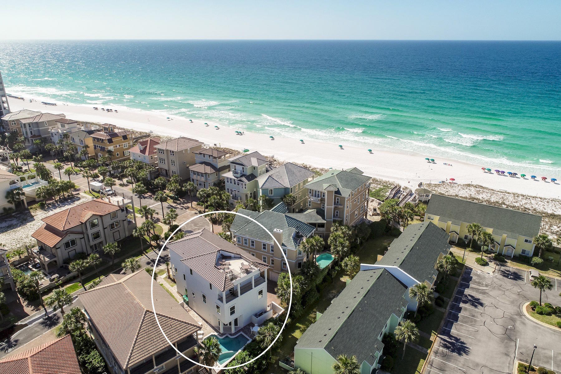 Exemplary coastal contemporary design perfectly situated two tiers off the beach to capture gulf views & masterfully configured providing unparalleled amenities including a Watermark-built private resort style pool area & adjoining spa as well as a covered outdoor summer kitchen. Exceptional income opportunity abounds with $237,000 in gross projected annual rental income. This home was designed to maximize functionality and finely appointed with chic contemporary finishes while affording optimal comfort & living space. Notable features include multiple indoor and outdoor living areas including a fourth story terrace capturing stunning gulf views and offering a western orientation for sunsets, private commercial grade elevator, dual master suites with gulf views, built-in Pinterest style bunkbeds, indoor and outdoor surround sound system as well as security cameras for optimal privacy. The first floor offers easy access from a spacious two car garage, dual bedroom suites with barn door accents as well as a large family room with easy access to the spacious private pool deck & outdoor living. The second floor is the focal point of indoor living space with a beautiful coastal living room featuring pecky cypress ceilings, ship-lap accents as well as ample windows to soak in natural light and open to the kitchen & dining room for optimal flow. The ample sized kitchen features floor-to-ceiling custom cabinetry, hand built custom hood perfectly framing the professional series gas range, stainless appliances and ample storage anchored by a large center island crowned with quartz countertops. The second floor also features two full bedrooms with ensuite bathrooms, laundry area and convenient half bath. The third floor features three full bedrooms including dual master suites with spacious porches, living area, bunk room as well as a fourth story viewing deck to maximize the incredible gulf and western oriented views that surround this prestigious home. Dunes of Destin enjoys private deeded beach access steps from the home in addition to exclusive amenities including gated access, community pool area and well manicured grounds centrally located near Destin's world class golfing, dining, shopping & entertainment.