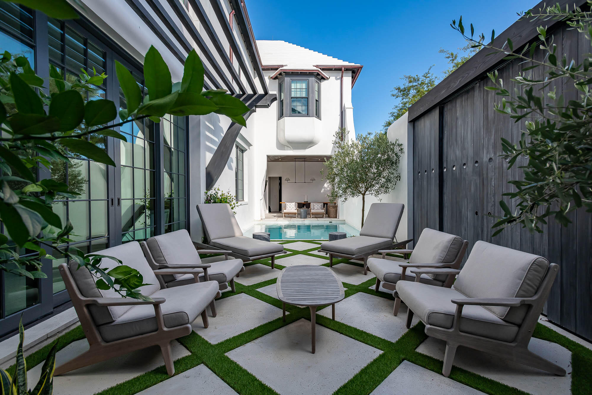 Designed by award winning architect Jeffrey Dungan, 16 South Charles Street is pure art. The execution of fixture finishes coupled with interior design selections by West Coast firm ODG Interiors, elevate this home to a level without equal along the Emerald Coast. Proudly anchoring the entrance of South Charles Street in Alys Beach, this house enjoys expansive sunrise and sunset views. 5,333 sf consisting of generous sized living spaces, bedrooms, and closets make this house a great option for the buyer seeking full-time living or a weekend getaway. A two car garage safely stores your prized cars and beach belongings. The large private courtyard pool and loggia area embody the best of indoor/outdoor living at Alys Beach. Take the party to the rooftop where you'll find a hot tub, fireplace, lounge area and wet bar.