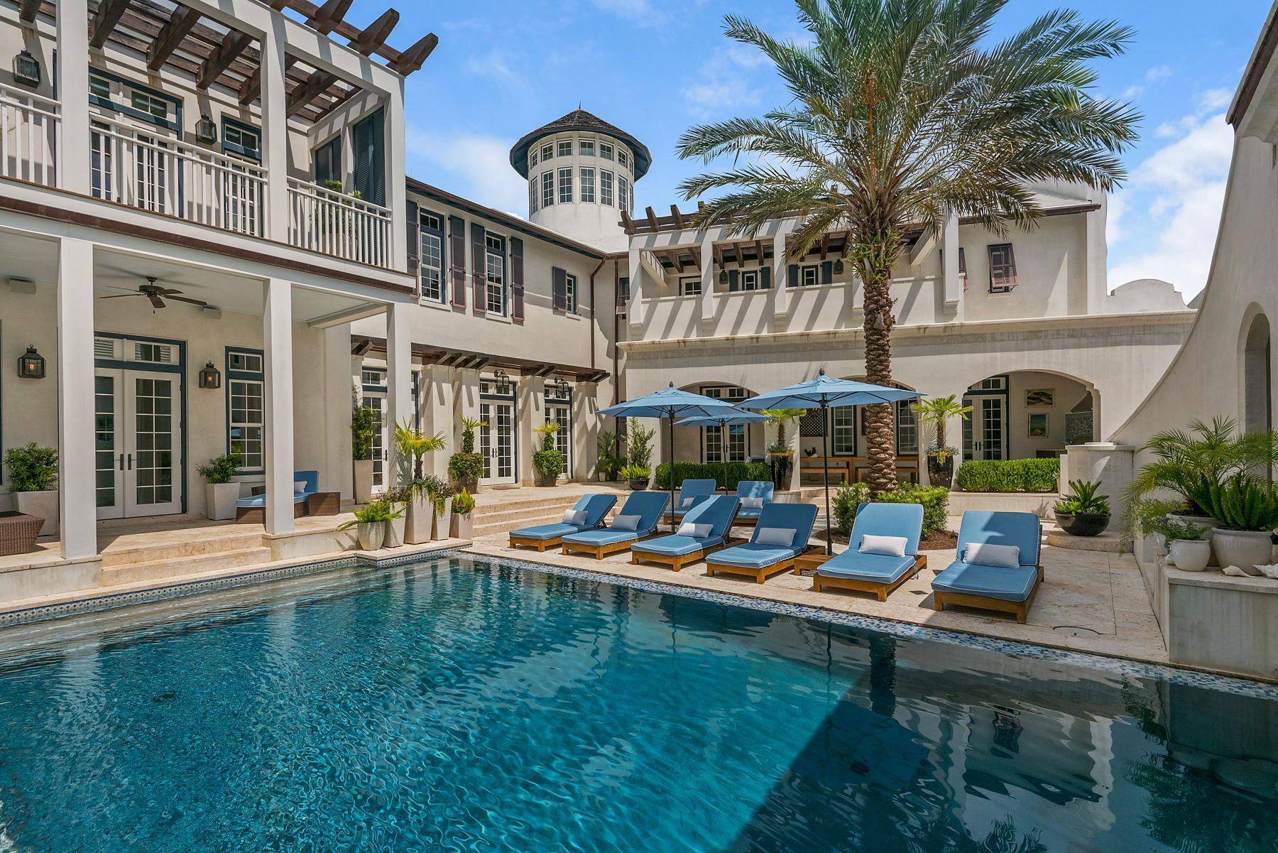 Located in the heart of Alys Beach, you will find a 6,880 square foot compound, built to surround residents in a beautifully and carefully crafted space that will both accommodate reunions of family and friends or a secluded getaway for two. Renown Florida architect Tom Christ of Christ and Associates designed this property to be a true one of a kind masterpiece. Walk through arched doorways into this stunning property that surrounds a private 42 ' saltwater pool with underwater music features, a sheer decent waterfall and a separate roof top spa. Gorgeous natural Coral Stone Tile floors line the interior and exterior living spaces, Calcutta Gold Marble stretches across kitchen and bathroom counter-tops, high beamed ceilings and white Venetian Plaster walls contribute to the light, bright and open feel of the residence.
 
This exclusive, one of a kind property invites you to stretch out and enjoy the expansive, luxury accommodations. Evening entertainment is made perfect with an outdoor fireplace, wet bar, gas grill, 2 outdoor dining areas and a rooftop terrace. Aspri Villa offers residents a formal dining room, breakfast bar, 6 bedrooms including 2 master suites and a kids bunk room, 7.5 baths and 5 fireplaces. This spacious estate also boasts a two bedroom cabana suite with a separate fireplace, mini-kitchen and 2 full baths.
 
Resting in the ultimate, new urban coastal community of Alys Beach, this property offers residents a private retreat that embodies the epitome of style and design. Duany Plater-Zyberk and Company, a Miami-based firm that is the recognized leader in traditional town planning, designed Alys Beach to embrace the beauty of Bermudan architecture and for residents to enjoy the relaxed coastal lifestyle as a way of life. Amenities available to Alys Beach homeowners include the impressive Caliza Pool, a 100-foot infinity-edge saltwater pool finished in limestone, as well as a family pool, 75-foot lap pool and whirlpool spa. Lakes, bike trails, parks and a 20-acre nature preserve provide further recreational opportunities. Residents also have access to the 30,000 square-foot Amphitheater of lush grass was designed to host outdoor concerts and cultural events against the backdrop of Medjool Date Palms. Stone paved paths line the entire community to make daily needs or a visit to the emerald waters and white sand beaches just a short walk away. Once you walk the enchanting halls or spend a day lounging by the pool in your private courtyard, you will not want to leave this magnificent property, Aspri Villa.