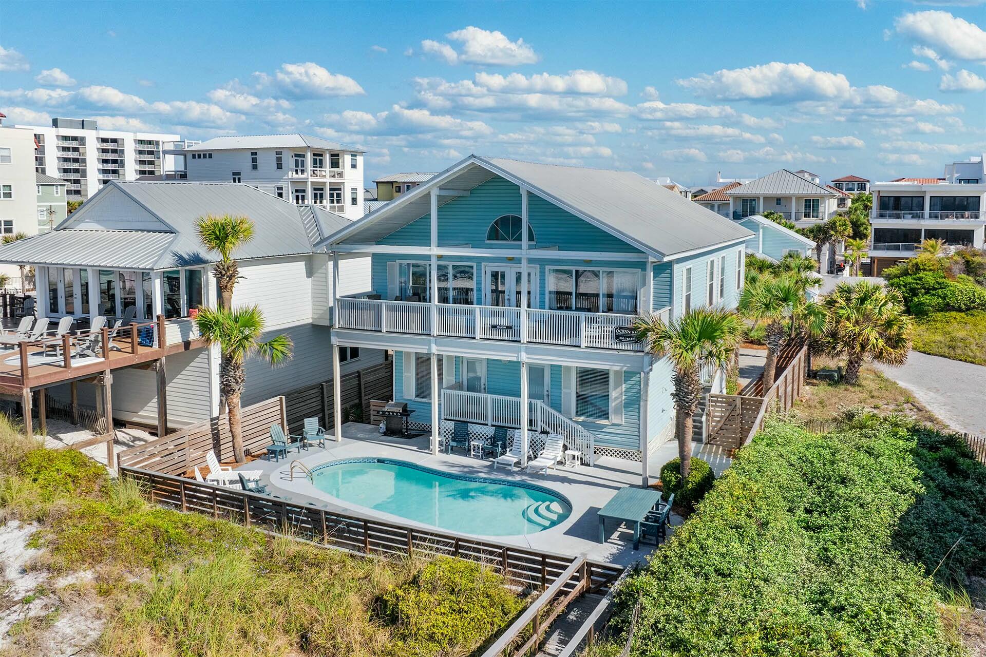 Seaspray: Gulf-Front Investment Opportunity Welcome to Seaspray, a spacious nine-bedroom beachfront estate located on over half an acre in beautiful Miramar Beach. This property is ideal for large family reunions or as a lucrative investment opportunity, with an impressive rental income potential of $300K annually. With a private pool and breathtaking Gulf views, Seaspray captures the essence of coastal living.

Main House: The six-bedroom, five-and-a-half-bathroom main residence offers a relaxed, functional layout for entertaining and vacationing: The first floor includes four bedroom suites, each with private bathrooms. These rooms range in style and feature two King Master Suites with views of the pool and Gulf, along with another King Suite and a children's bunk room with queen bunks and a queen trundle.

Upstairs, the open living area provides expansive Gulf views through large windows. This space includes a vaulted ceiling, comfortable seating, a dining area for eight, and a practical kitchen with two refrigerators and two dishwashersperfect for preparing meals for a crowd. Additional sleeping spaces on this floor include another King Master Suite and a guest room with queen bunks.

Guest Cottage: The charming guest house includes three bedrooms and two bathrooms:

On the first floor, you'll find a King Master Suite with access to a full hall bathroom and an open living area connected to the kitchen and dining space.

Upstairs, two Queen Guest Bedrooms share a full bathroom, offering privacy and comfort for additional guests.

Upgrades & Features: The property includes several recent updates for added convenience:

Trex decking and a pool deck remodel (2021)

New roofs (Main House: 2016, Cottage: 2023)

Tile flooring in the Cottage (2022)

Updated kitchens (2020), including built-in media-ready queen bunks installed in 2019

Additional Highlights:

Located on a private drive (Sandy Beach Road), with verified legal documentation ensuring privacy and towing for unauthorized parking.

Ownership extends to the mean high water mark, with supporting documentation available, offering significant Gulf-front property rights.

Seasonal beach service with three complimentary setups provides easy access to the stunning shoreline.

Endless Potential: Seaspray offers an exceptional opportunity as both a vacation retreat and an income-generating property. Its prime location, ample space, and desirable features make it an investment worth considering for those seeking to enjoy or profit from the Gulf Coast lifestyle.
