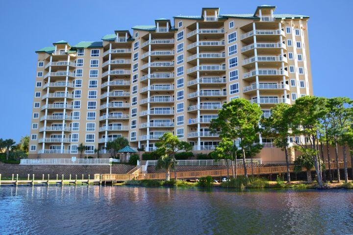 This is a short sale- subject to Lender/ Bank Approval.  This condominium is being offered in its current condition and reflects deferred updates
The views of the Harbor and Gulf are amazing at Sunrise or Sunset.     This penthouse unit has four bedrooms, each with it own bathroom.  The kitchen is open space with small pantry but has original appliances.  The upstairs has a built in bookshelves with pool table.  This penthouse does not have a boatslip. The inspection report  and contractor renovation estimates are available for review.  Buyer to verify all details and measurements.  No Short Term Rentals Grand Harbor also offers residents access to a range of amenities, including a sparkling swimming pool, fitness center, and a pier for boating enthusiast concierge services.   This unit is situated in the highly sought-after Grand Harbor community with no short term rentals.  It is easy access to Destin's finest shopping, dining, and entertainment options.  With the harbor just steps away, you can immerse yourself in the vibrant coastal lifestyle, with boating, fishing, and water sports right at your doorstep.