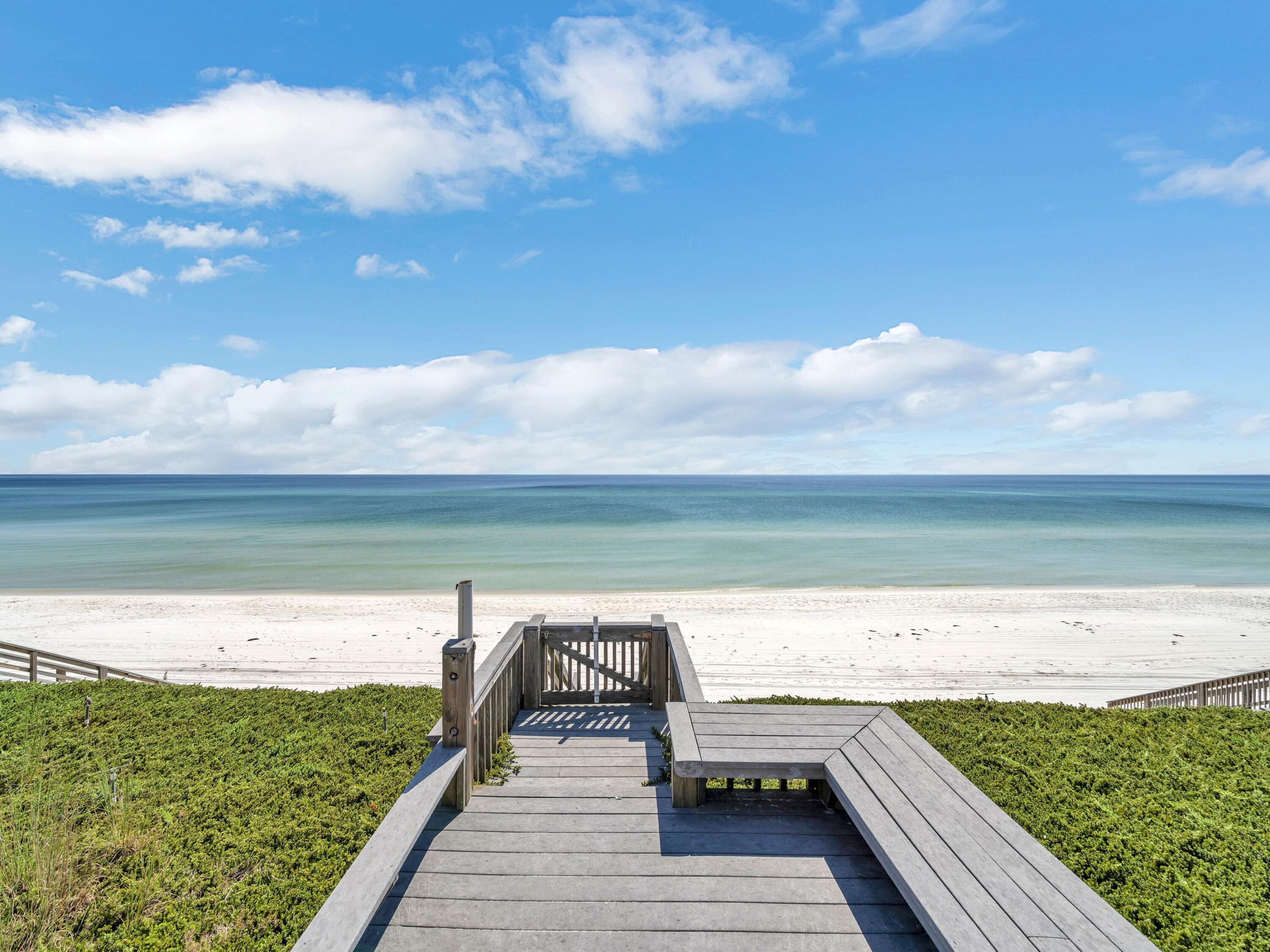 This long-standing beach house is in an unbeatable location within an exclusive private beach community at the east end of 30A. It's perfect for beach lovers with its own private beach walkover. Look forward to morning strolls on the quiet beach with just pelicans and dolphins for company. This traditional beach house has high ceilings, three beds, three baths and a two-car garage. However, its true value is in the prime beachfront location of the lot. Sitting high on the bluff, it delivers outstanding views across the emerald Gulf of Mexico as far as the eye can see. Ideal as a primary or vacation home, this property is in a strictly non-rental gated community. It enjoys an exclusive environment for those who value their own privacy and security. Built in 1989, this home sits on a prized 200x50 lot. New owners may eventually want to replace it with their own dream luxury new build in this enviable location. 

Please inquire about the seawall installed in 2006.