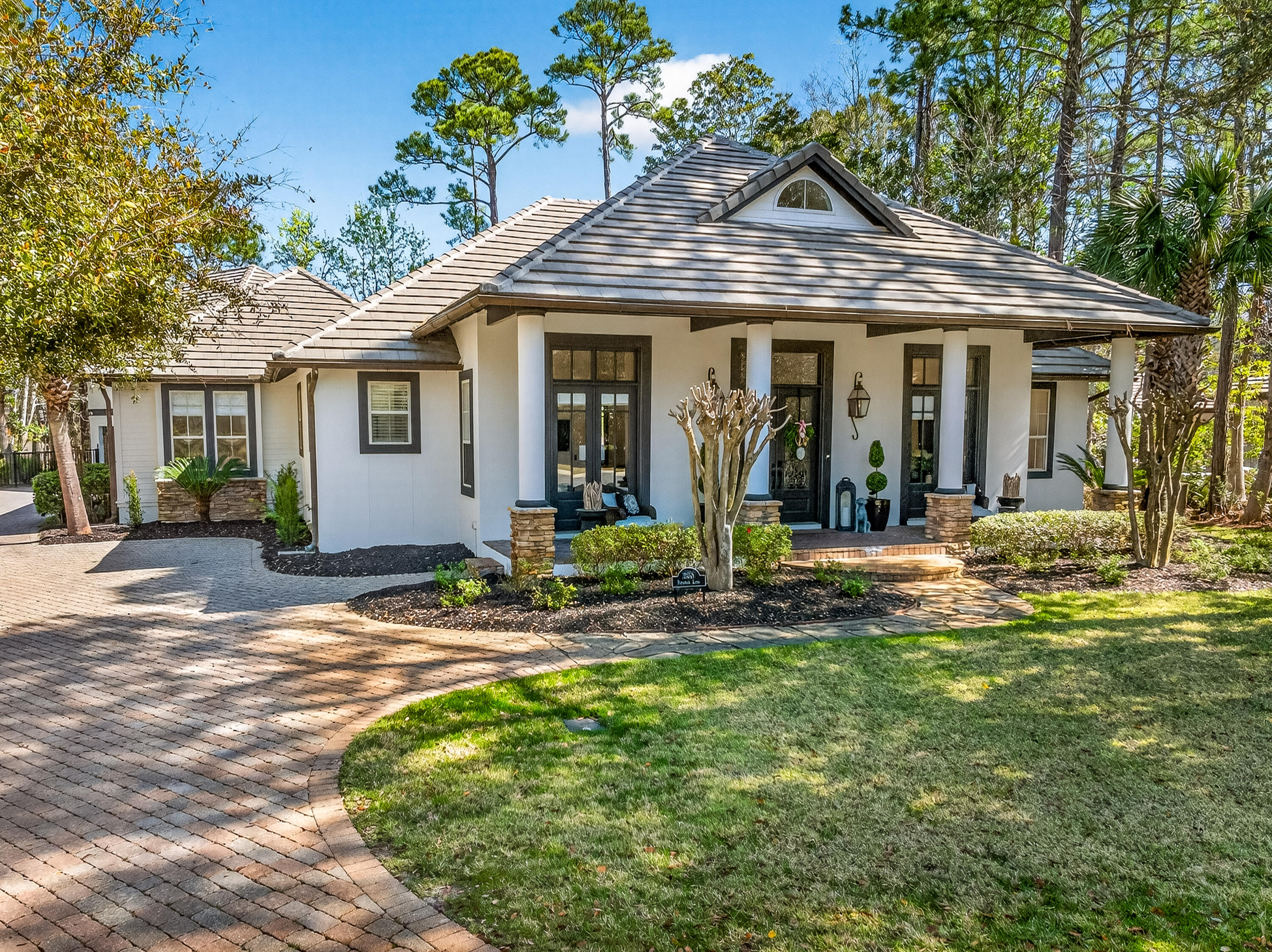 Tucked away in the exclusive Preserve neighborhood within Burnt Pine at Sandestin Golf & Beach Resort, 3558 Preserve Lane offers refined, single-level living with exceptional indoor and outdoor spaces. Soaring 25-foot ceilings in the great room create an airy, grand feel, while beautiful hardwood flooring throughout the main living areas adds warmth and elegance.
Extensively updated over the past year, the home features beautifully renovated bathrooms, including a stunning primary bath with a luxurious wet room and clawfoot tub. Numerous improvements enhance comfort and functionality throughout, including new hot water heaters, new coils on the HVAC systems, updated indoor lighting and ceiling fans, replaced recessed lighting, new window blinds, upgraded closet systems, enhanced pantry storage with rolling shelves, and thoughtful additions such as built-in shelving with lighting beside the fireplace and added cabinet lighting in the kitchen.

The home is designed for effortless indoor-outdoor living, opening to a private backyard retreat featuring a pool, outdoor kitchen, and generous covered areas ideal for relaxing or entertaining. Recent exterior improvements include fresh exterior paint, a new concrete pool deck, new fencing, refreshed landscaping, new outdoor lighting and ceiling features, an upgraded irrigation system, and a new sand filter for the pool.

Perfect for guests or extended family, the spacious one-bedroom carriage house sits above a 2.5-car garage--offering room for two vehicles plus a golf cart--and features its own full kitchen and living room. Recent updates include new granite on the island with a backsplash and a brand-new outdoor staircase providing convenient access.

Ideally located just around the corner from the private Burnt Pine Golf Club, this exceptional property blends comfort, quality, and convenience within one of the most sought-after enclaves in Sandestin. The home is offered fully furnished and includes two golf carts, making it easy to begin enjoying the Sandestin lifestyle from day one.