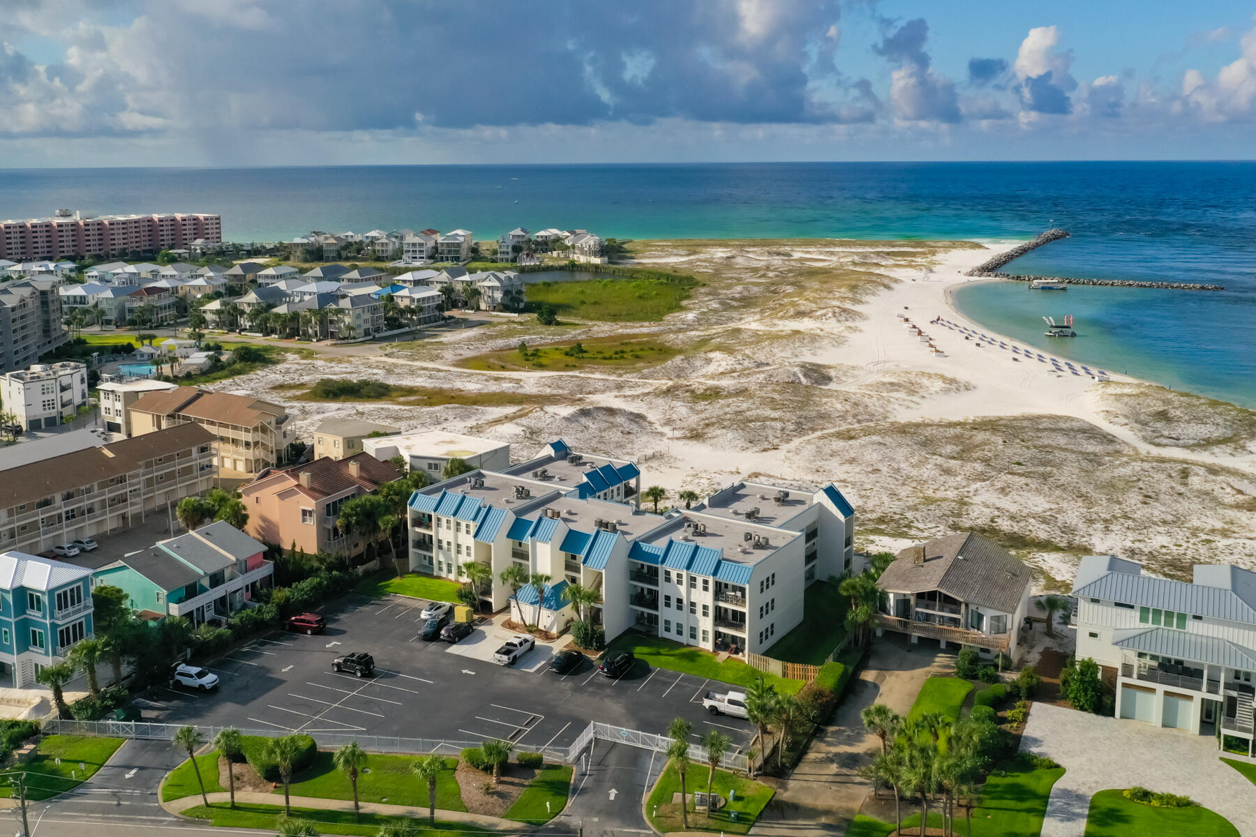Welcome to your own slice of paradise at Poolside Villas on Holiday Isle!
This beautifully maintained 2-bedroom, 2-bath condo offers the ultimate beachside lifestyle with direct private beach access and a sparkling community pool. Located in a gated, 30-unit complex, Poolside Villas has a strong rental history, making this an exceptional investment or second home.
Recent upgrades to this community include the completed State Milestone Inspection and a $2 million exterior renovation, giving you peace of mind for years to come. Inside, you'll find a bright, coastal-inspired interior with durable LVP flooring, an in-unit washer and dryer, and a well-appointed kitchen... ready for your favorite recipes. From the entry area, step out to a balcony overlooking the Gulf, where you can enjoy beautiful sand dune scenery, coastal breezes, and the occasional fireworks show. The living area opens to a second balcony that looks out to the Harbor making it the perfect spot to experience charter boats return through Destin's famous, East Pass.
This condo offers flexibility as a full-time residence, vacation home, or income-producing property, all conveniently located near a variety of shopping, dining and entertainment. You'll even have water taxi access to the Harbor, making it easy to enjoy the area without driving.
Don't miss this opportunity to own a total turnkey beach getaway in one of Destin's most peaceful and picturesque settings!