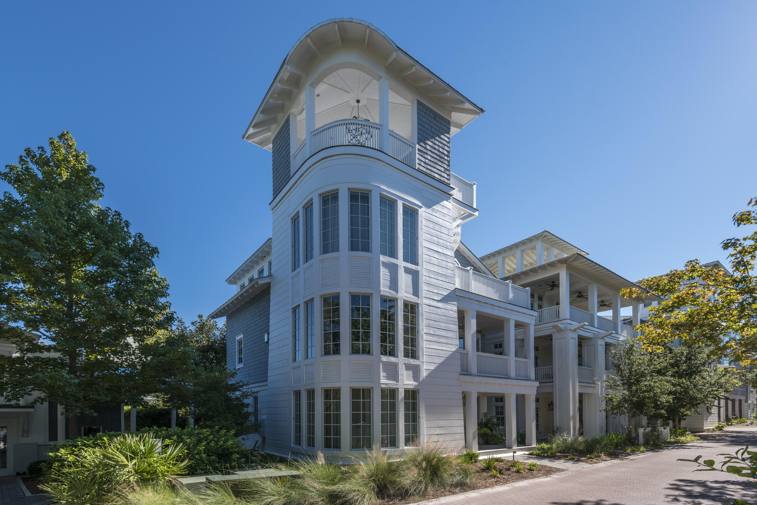 Recently built by one of 30A's most acclaimed Builders as his personal home, no expense was spared on this open living concept home featuring a glass elevator, Loewen Lift Slide doors that enlarge the main living area, a tower living space with Gulf Views with a custom built contemporary fire table with a radius sofa surround. Standing Seam Metal Roof. Highly efficient HVAC, Steam Shower unit in the Spa like Master Bath, high end state of the art custom Lighting/Automation/Audio Video system, central VAC, butlers pantry, duel sub zero refrigeration units, two inch reveal on a 14 ft. Calcutta marble island in the kitchen,custom built furniture and art work, over $200k spent on the interior design and custom window treatments, The Seaside Home Owners collection has a rental projection of over $197,000 reflecting this homes ability to be marketed as a five star luxury rental