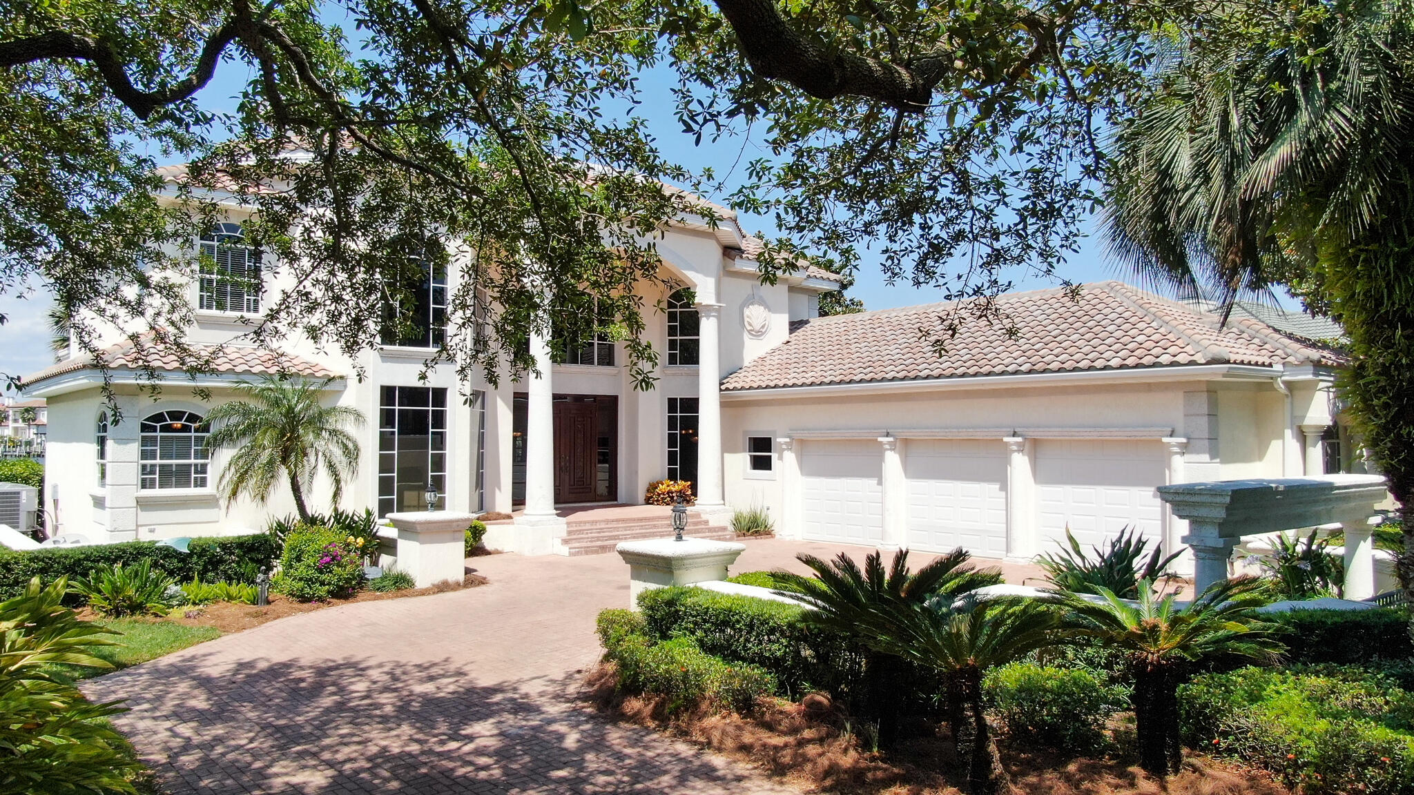 Your opportunity has arrived!  ''Spectacular views'' simply doesn't do justice to this Jones Bayou waterfront home.  Take advantage of the rare opportunity to own and enjoy the lifestyle that is waterfront living within the master-planned, gated community of Kelly Plantation.  This custom built home was designed by Rick Brautigan out of south Florida and has exquisitely unique architectural accents and features throughout the estate.  
The attention to detail is evident from the grand entrance with a panoramic view of the bayou and bay  the Tuscan style kitchen and breakfast nook.  
As you enter the vast openness of the living area, you will see the formal dining room to the right  and the Master suite to the left. The Sub-Zero refrigerator and gourmet gas range are just a few the items that set this gourmet kitchen apart.  The sunken bar in the living room is also a fabulous feature for entertaining and hosting family gatherings alike.  as you enter the master suite, you will appreciate the ensuite bayou front office with access to the back patio.  The master spa-like bathroom will allow for relaxing and refreshing after a fun day on the water or a long day at the office.  The four additional bedrooms are on the second level and each are connected to a jack and Jill type bathroom, giving you four bedrooms and two full bathrooms upstairs.  The three car oversized garage gives you plenty of room to store everything you will need to stay and play in Kelly Plantation and the curb appeal in this home is truly amazing.  You will not want to wait to make your appointment to tour this home.
